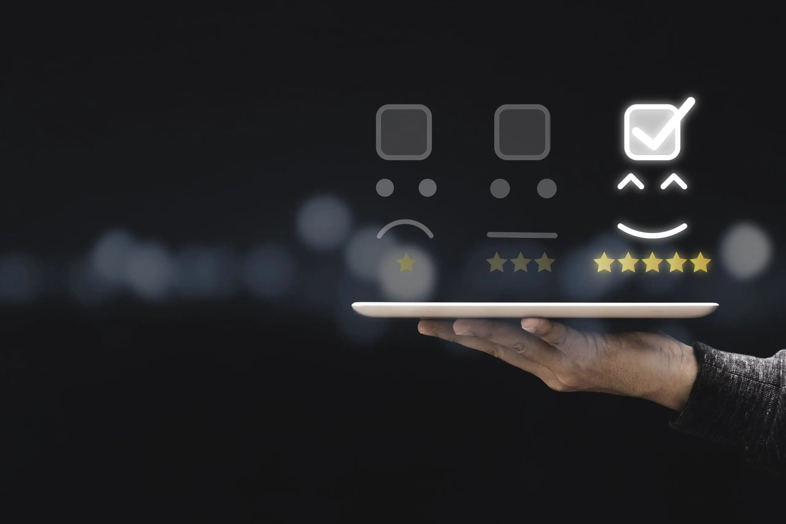 How we Conducted B2B Customer and Product Survey for ESDS India businessman-holding-tabletand-showing-customer-online-evaluation-result-five-star-1-scaled