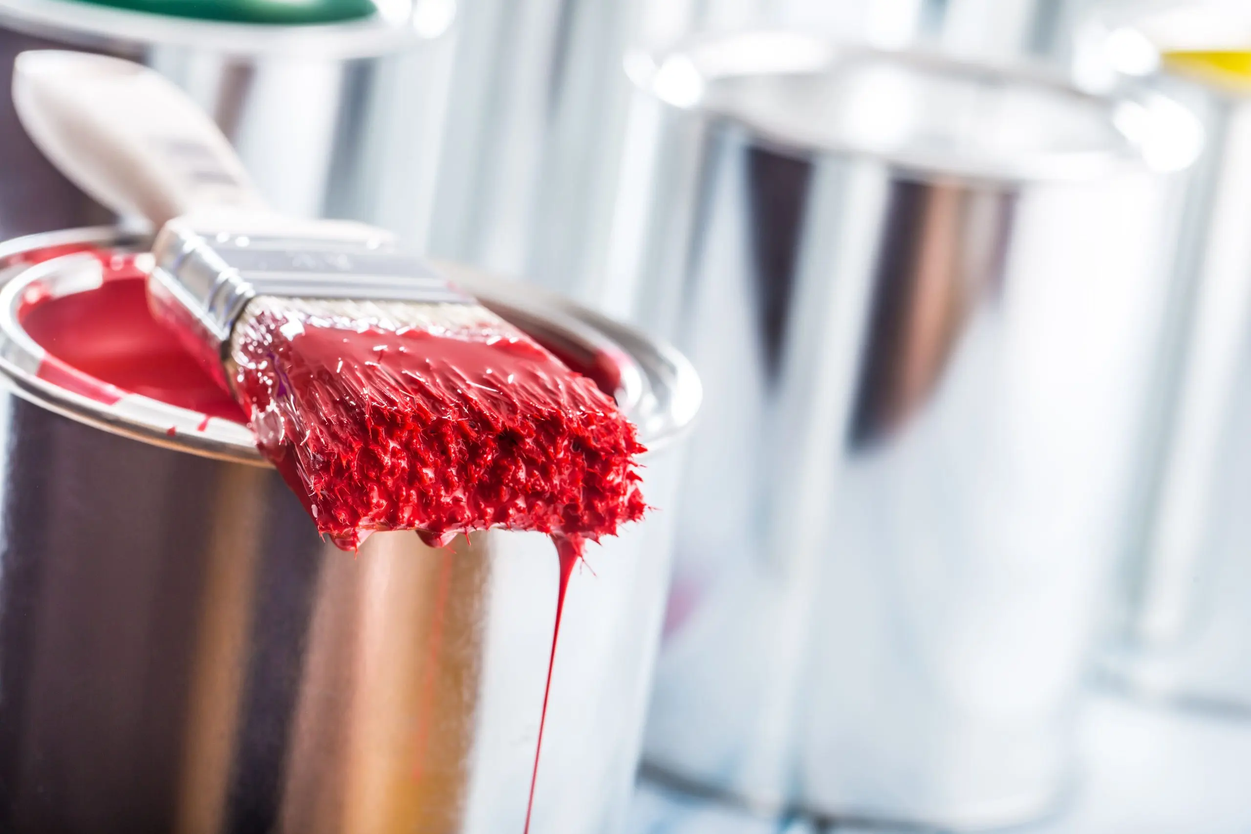 Conducted Distributor Survey for Decorative Paints Player to Assess India’s Paint Industry close-up-brush-with-red-color-lying-paint-can-1-scaled