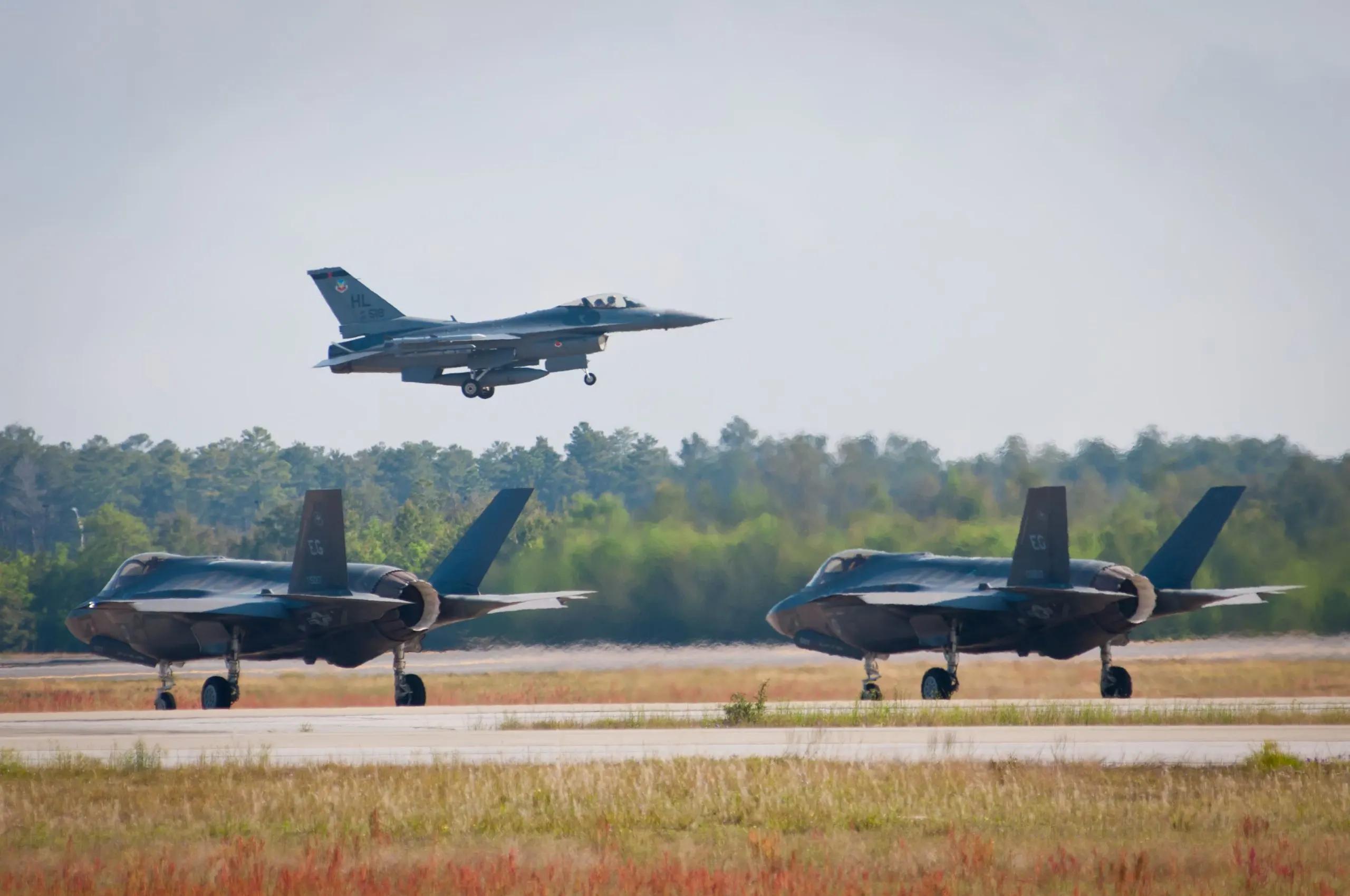 KSA military training aircraft Market outlook to 2035 fighter-jet-is-flying-sky-with-another-jet-background-1-scaled