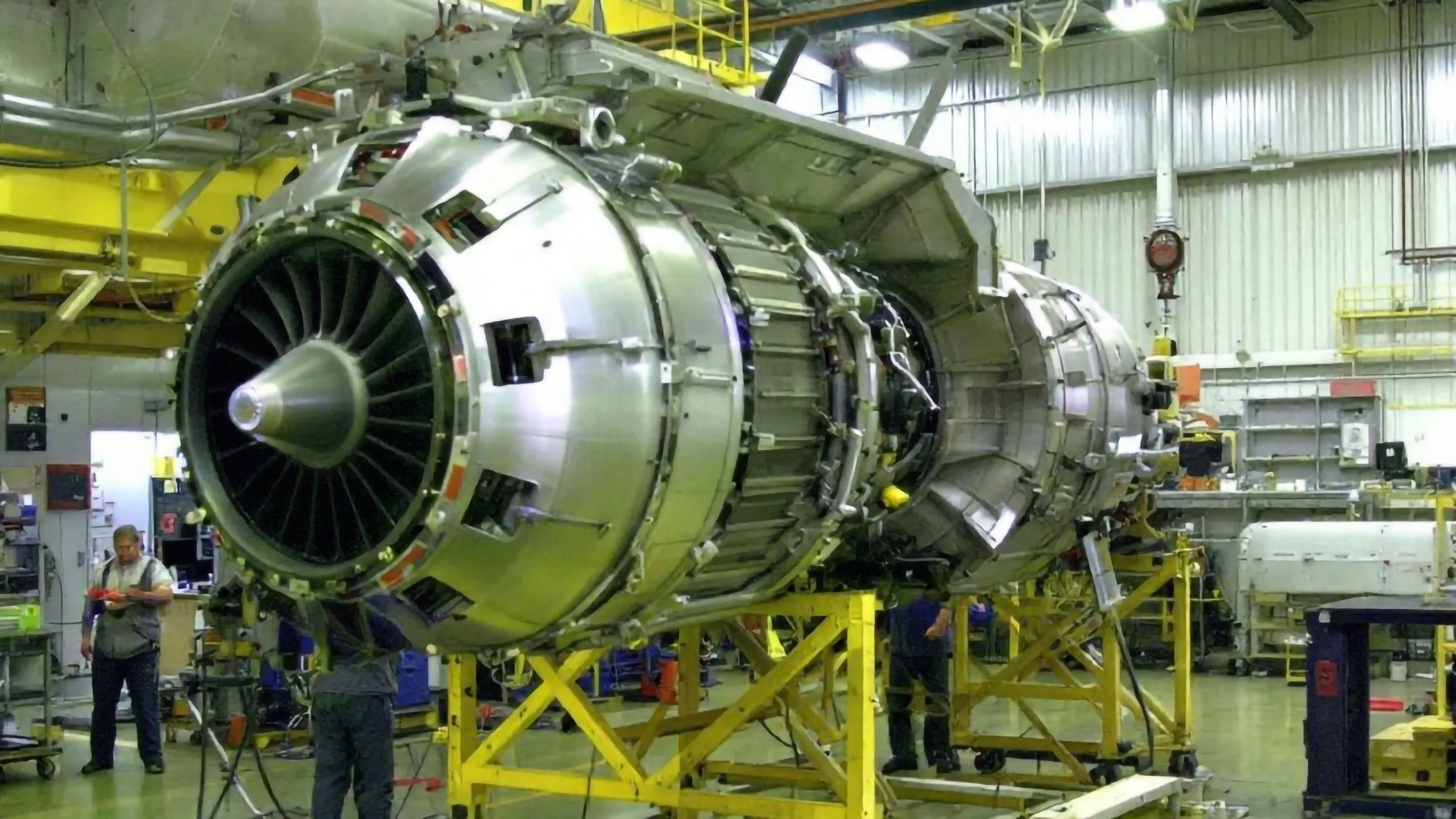 Singapore aircraft auxiliary power unit Market outlook to 2035 large-jet-engine-is-factory-with-other-parts-waiting-repair-maintenance-1-scaled