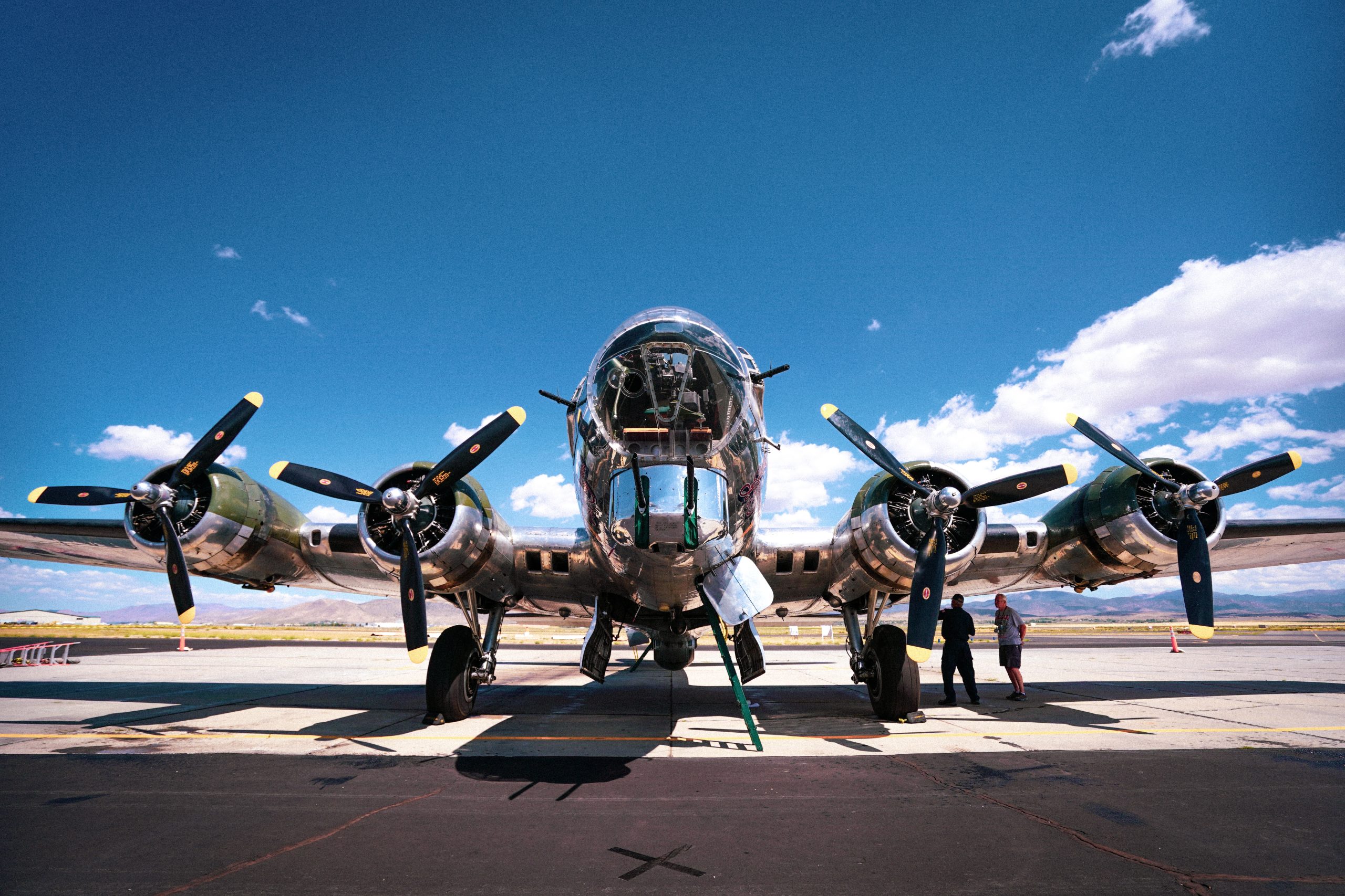 low-angle-shot-b-17-bomber-plane-from-wwii-captured-airbase-sunny-day-scaled