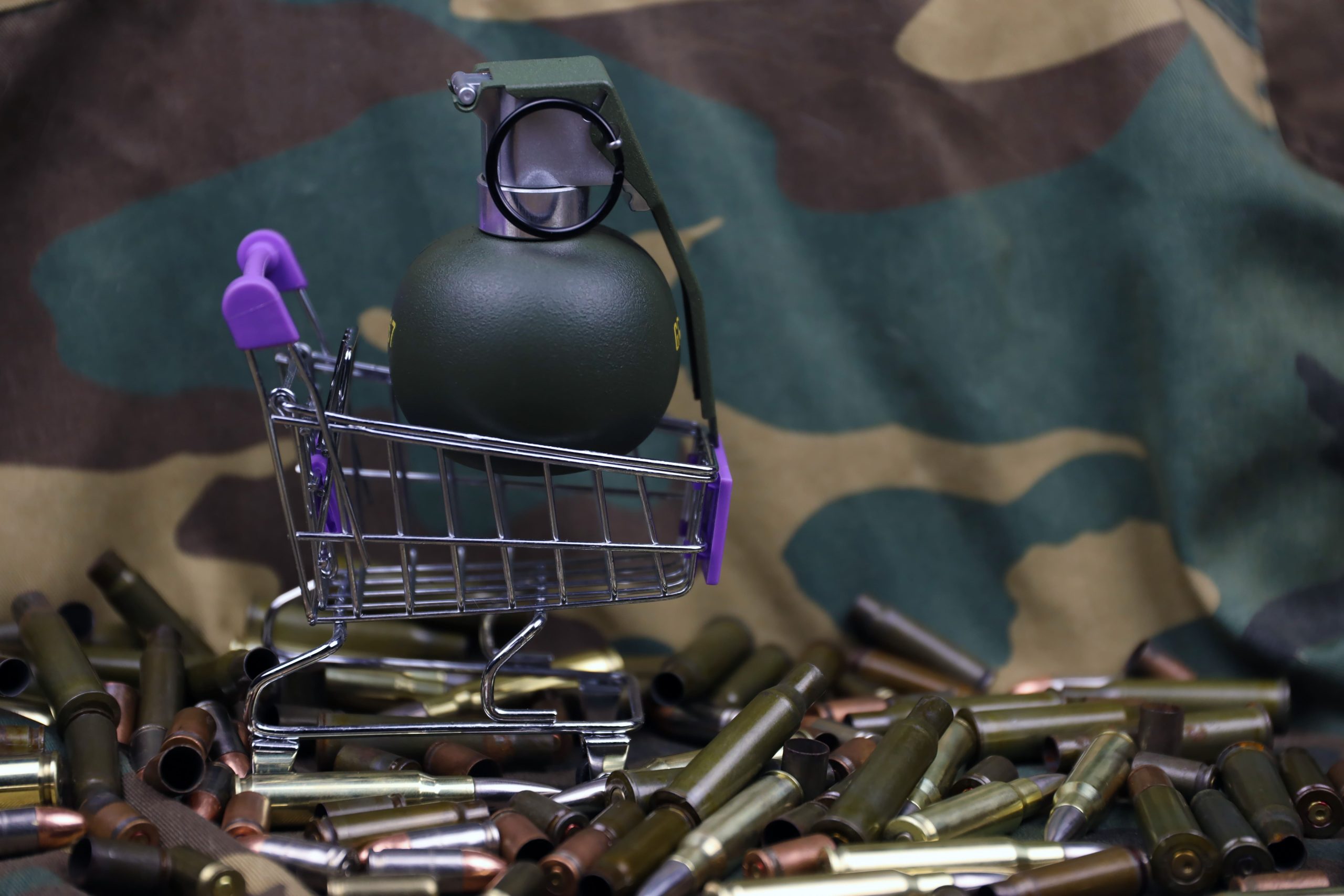 Israel naval ammunition Market outlook to 2035 rifle-cartridges-small-shopping-cart-big-caliber-ammo-cartridges-hand-grenades-with-small-1-scaled