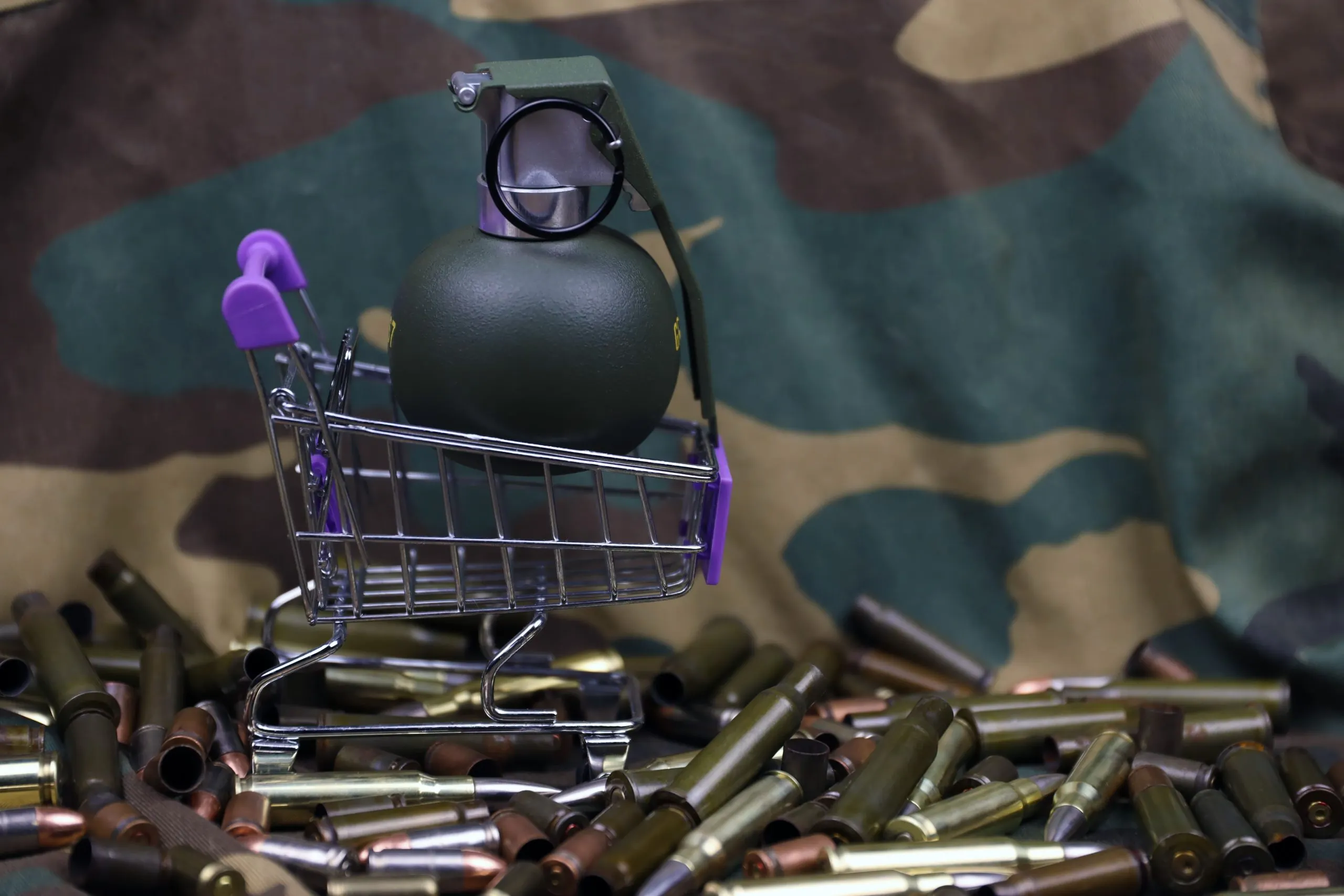 Israel naval ammunition Market outlook to 2035 rifle-cartridges-small-shopping-cart-big-caliber-ammo-cartridges-hand-grenades-with-small-1-scaled