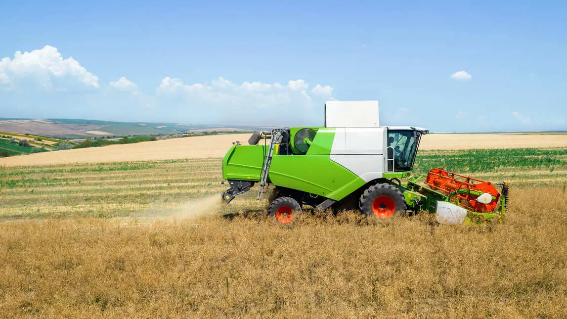 India Used Harvester Market Outlook to 2035 aerial-drone-view-harvester-gathering-crops-2
