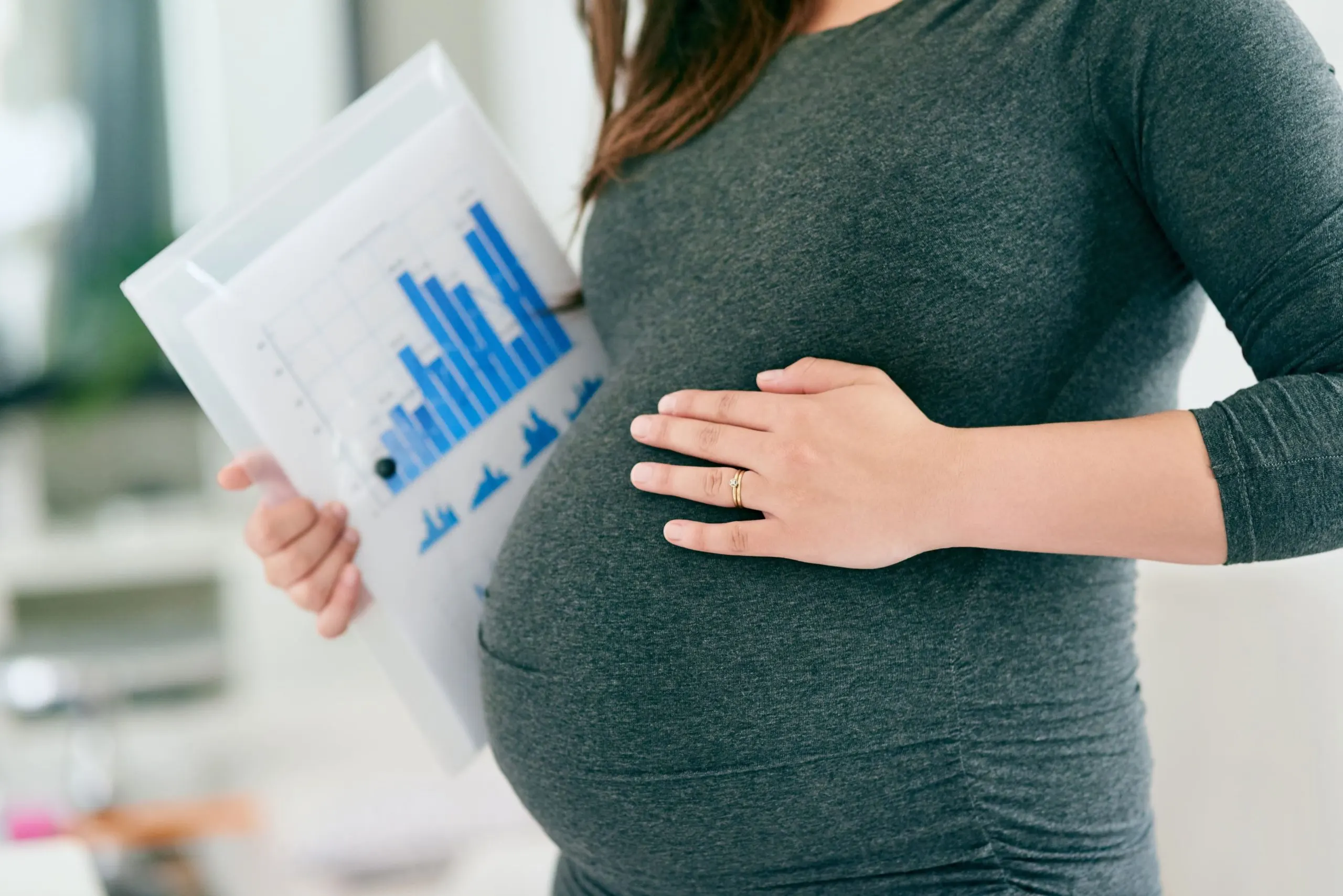 India IVF market outlook to 2035 being-mother-is-full-time-job-cropped-shot-unrecognizable-pregnant-woman-working-home-1-scaled