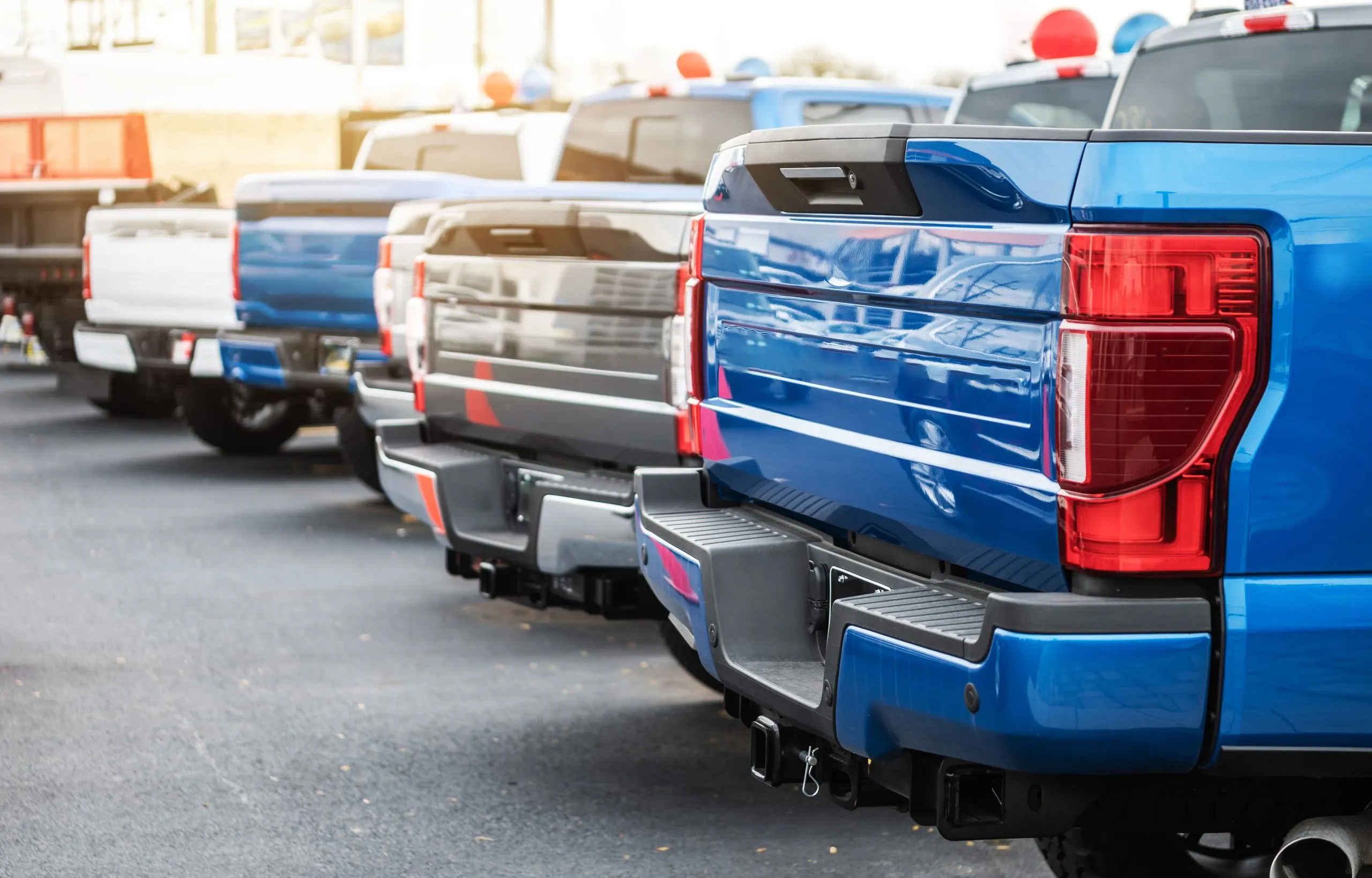 USA Automotive Doors Market Outlook 2030 brand-new-pickup-trucks-vehicles-dealership-lot-1-scaled