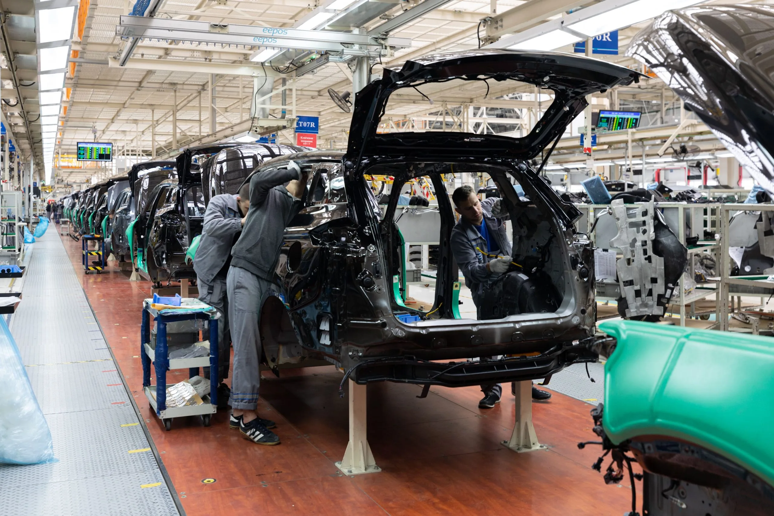 USA Automotive Bumpers Market Outlook 2030 car-bodies-are-assembly-line-factory-production-cars-modern-automotive-industry-car-being-checked-before-being-painted-hightech-enterprise-1-1-scaled