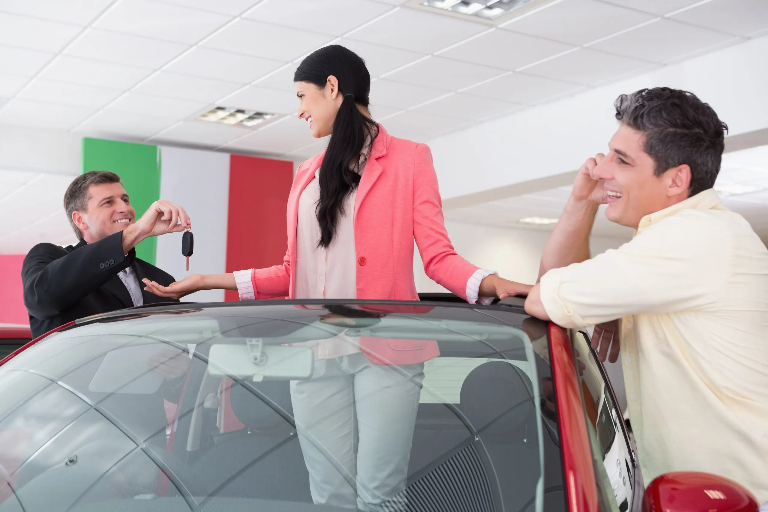 USA Sunroofs Market Outlook 2030 cheerful-woman-standing-red-cabriolet-1-scaled