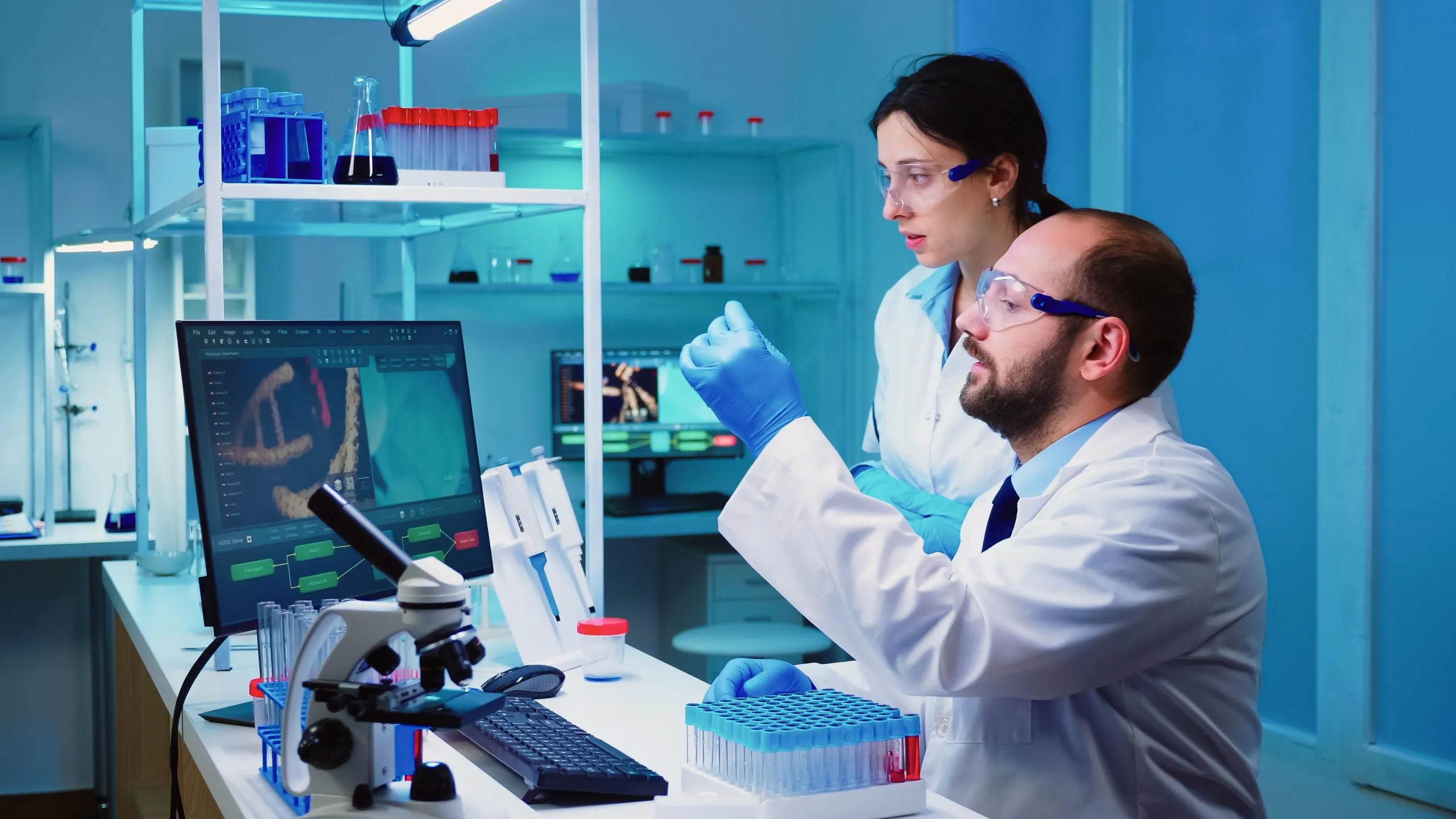 UAE Prenatal Genetic Testing Market Outlook 2030 chemist-nurse-holding-test-tubes-bringing-doctor-conducting-dna-experiment-discussing-about-medical-treatment-working-overtime_compressed-scaled