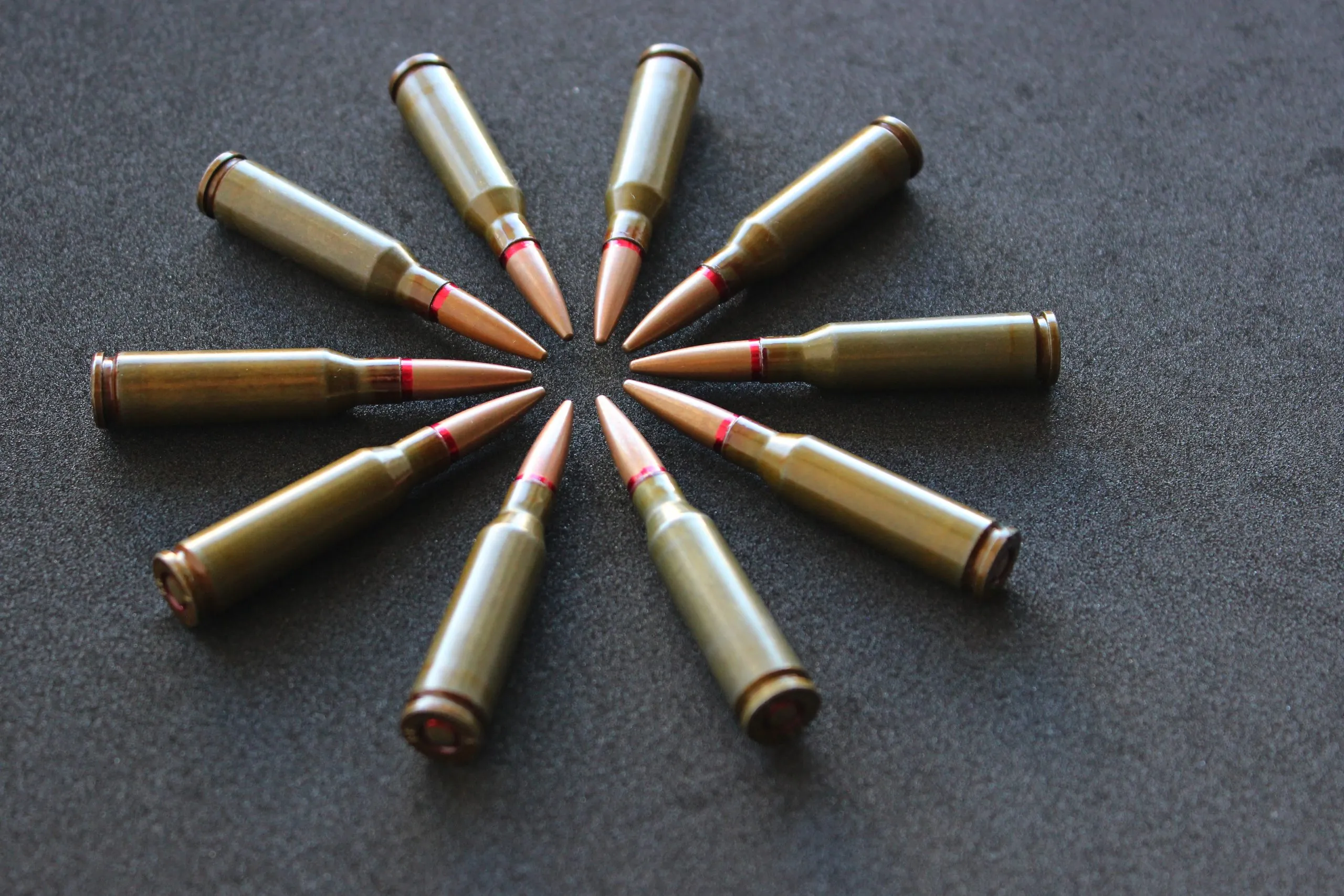 KSA Artillery Ammunition Market Outlook 2035 circle-made-with-bullets-laid-out-head-head-order-black-velvet-upholstery-closeup-view-scaled