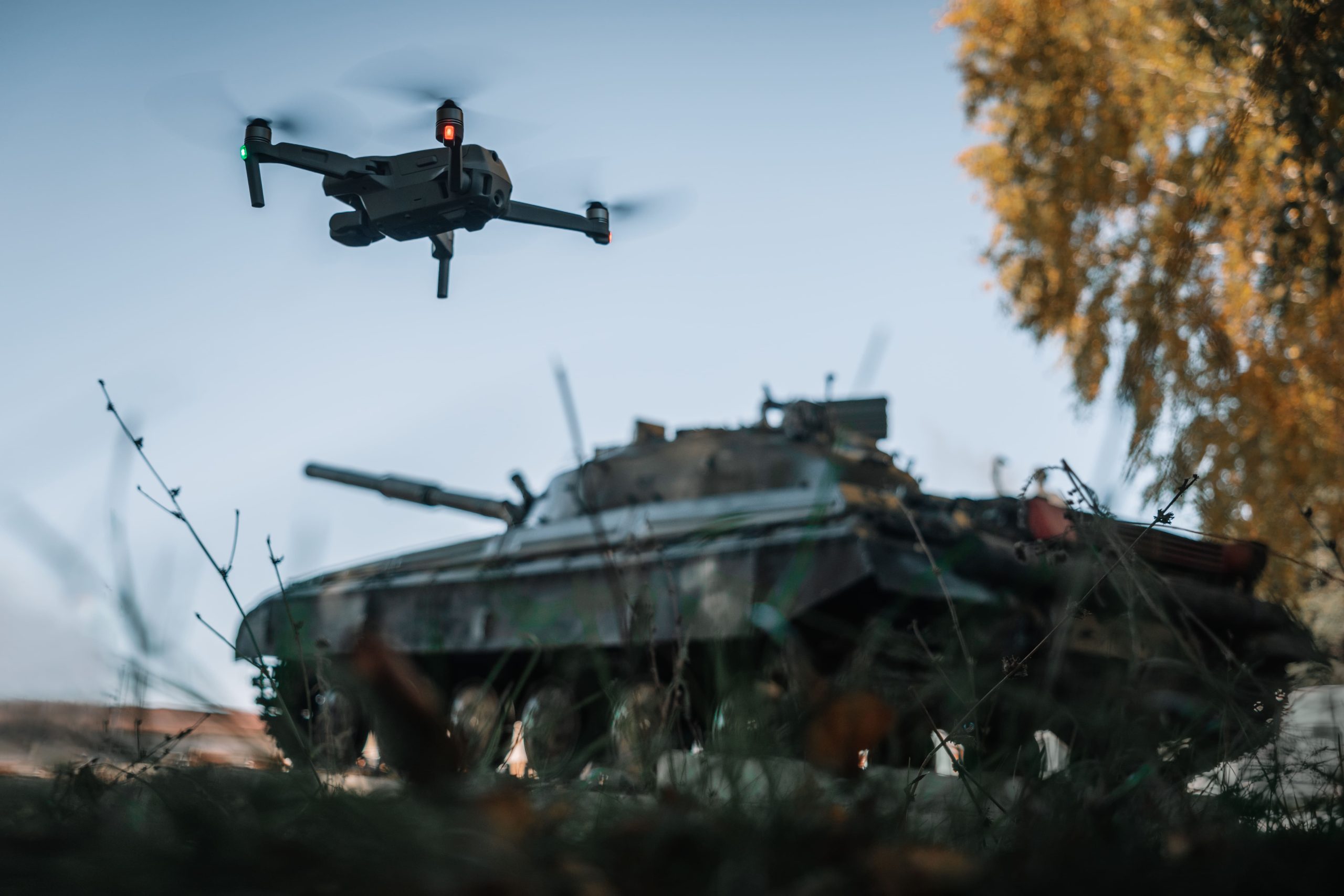 drone-flying-tank-background-nature-help-reconnaissance-drones-modern-warfare-1-scaled