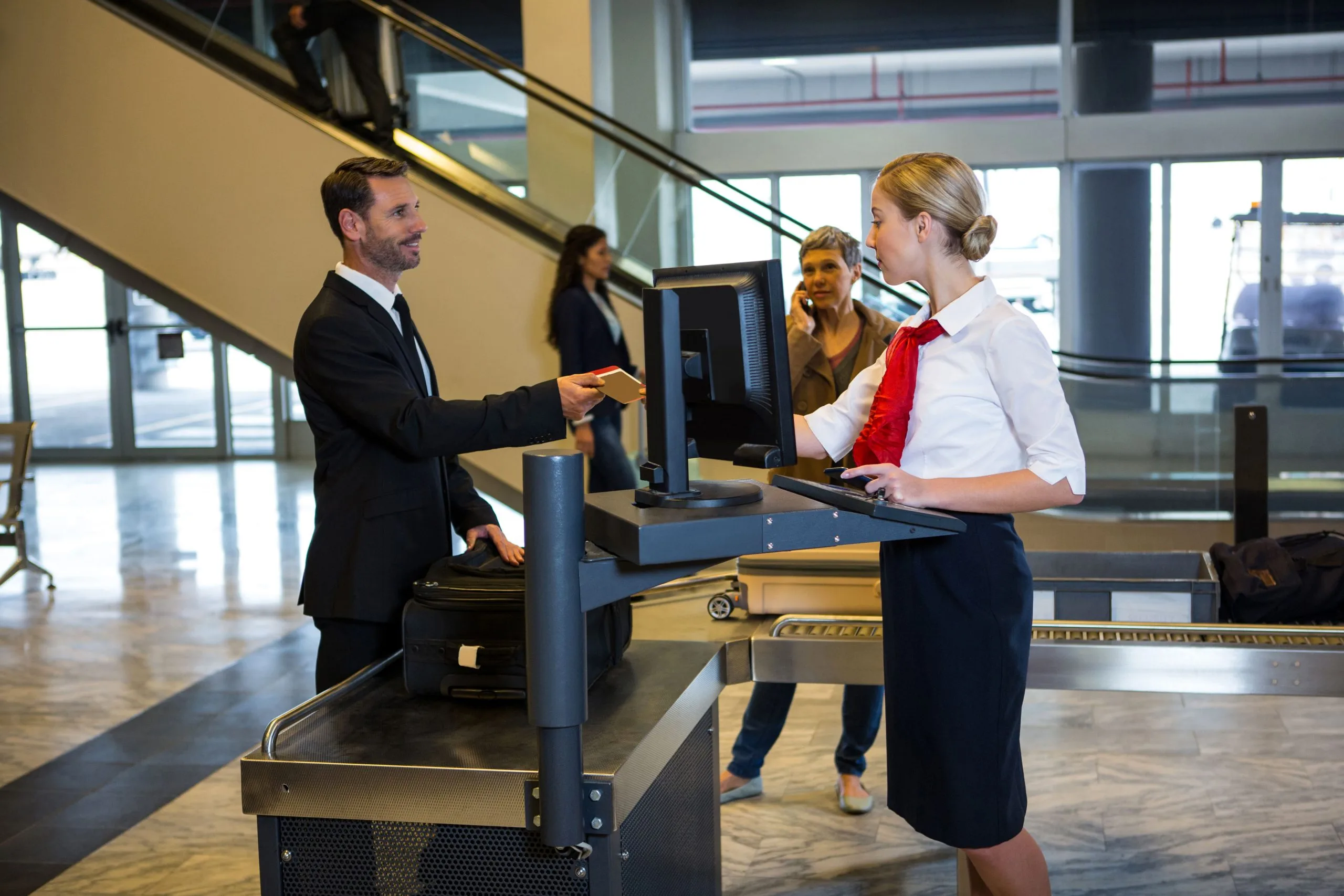 USA business jet ground handling services Market outlook to 2035 female-staff-interacting-with-passenger-1-scaled