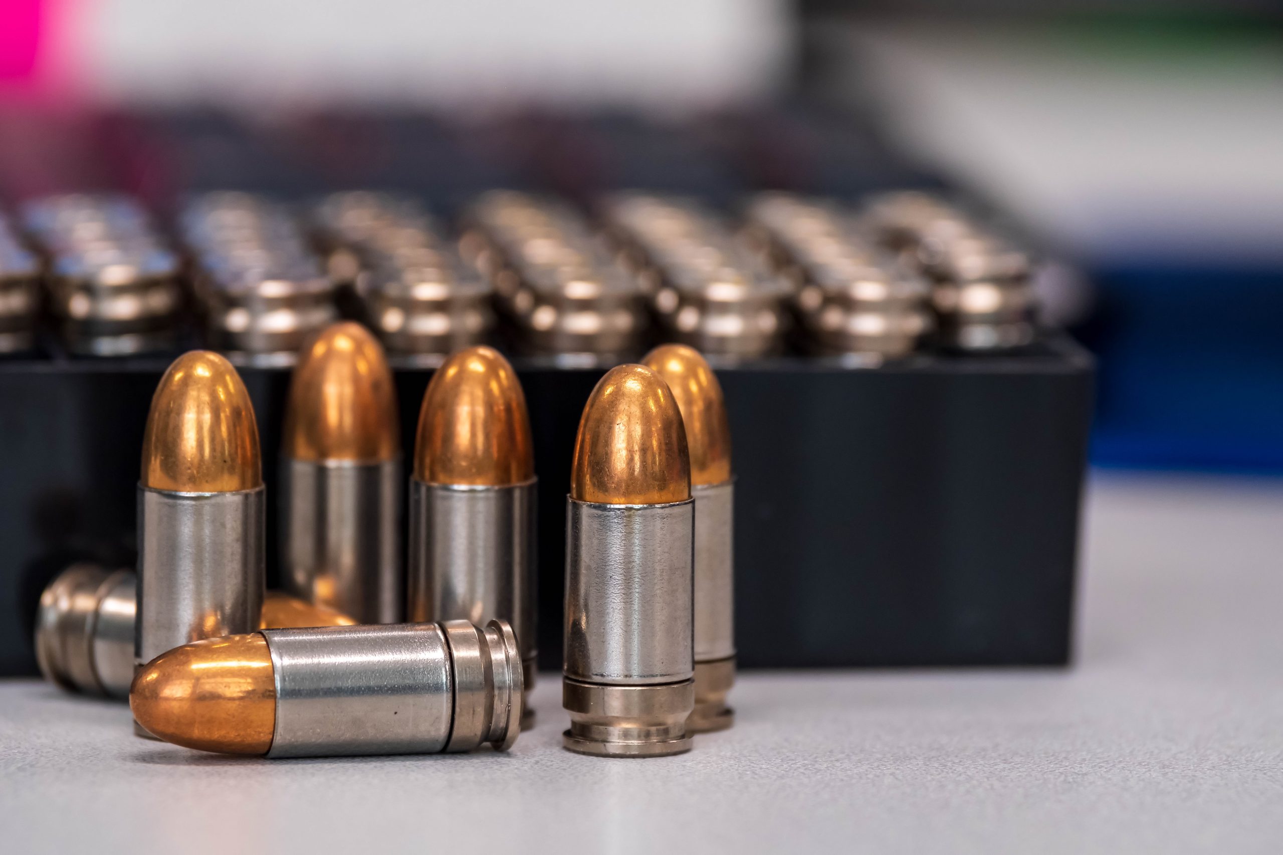 US medium and large caliber ammunition Market outlook 2035 handful-shortbarreled-bullets-were-placed-table-beside-numerous-boxes-ball-bearings-scaled