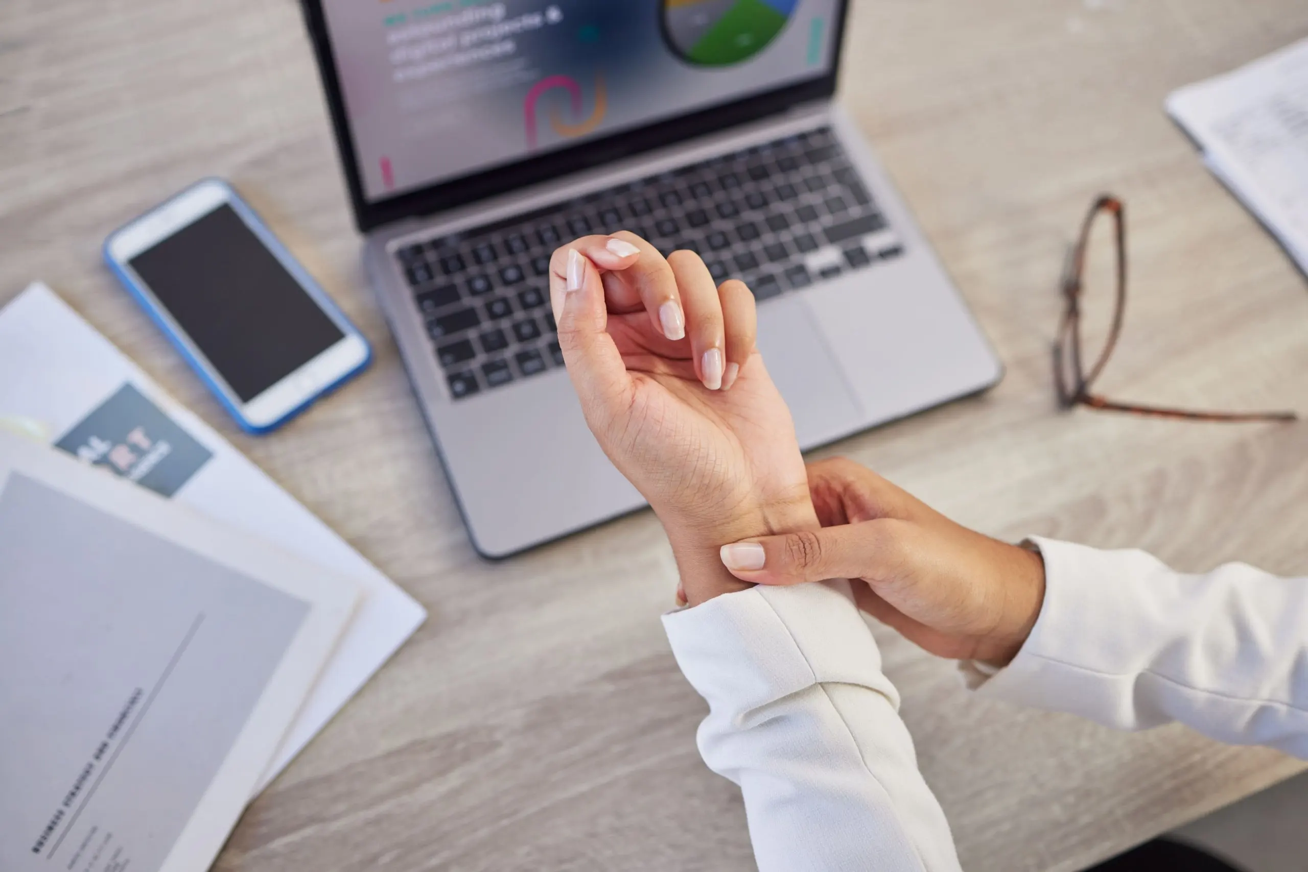 UAE Stress Testing Market Outlook 2030 hands-business-woman-pain-wrist-from-typing-laptop-orthopedic-injury-health-risk-from-closeup-worker-carpal-tunnel-muscle-problem-from-stress-fibromyalgia-arthritis-1-scaled