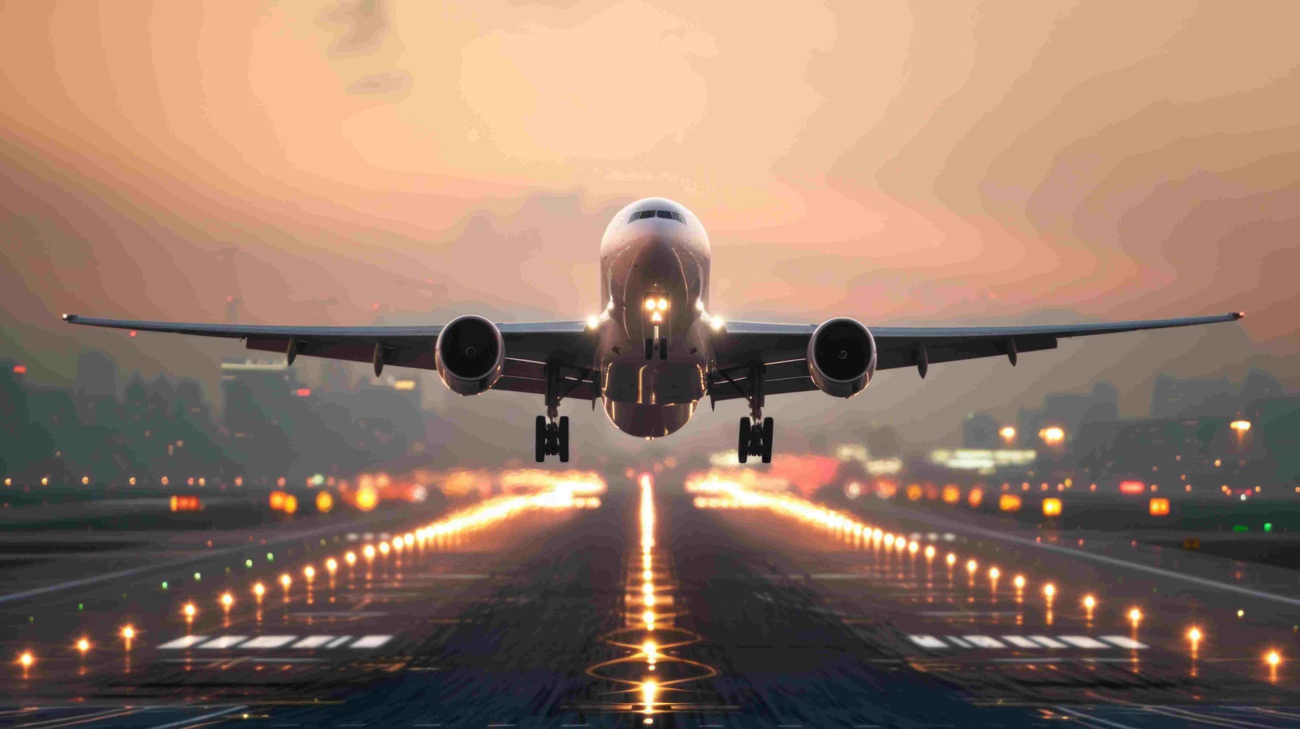 Qatar Aviation Market outlook to 2035 large-plane-landing-airport-with-beautiful-sunset-high-resolution-quality_compressed-scaled