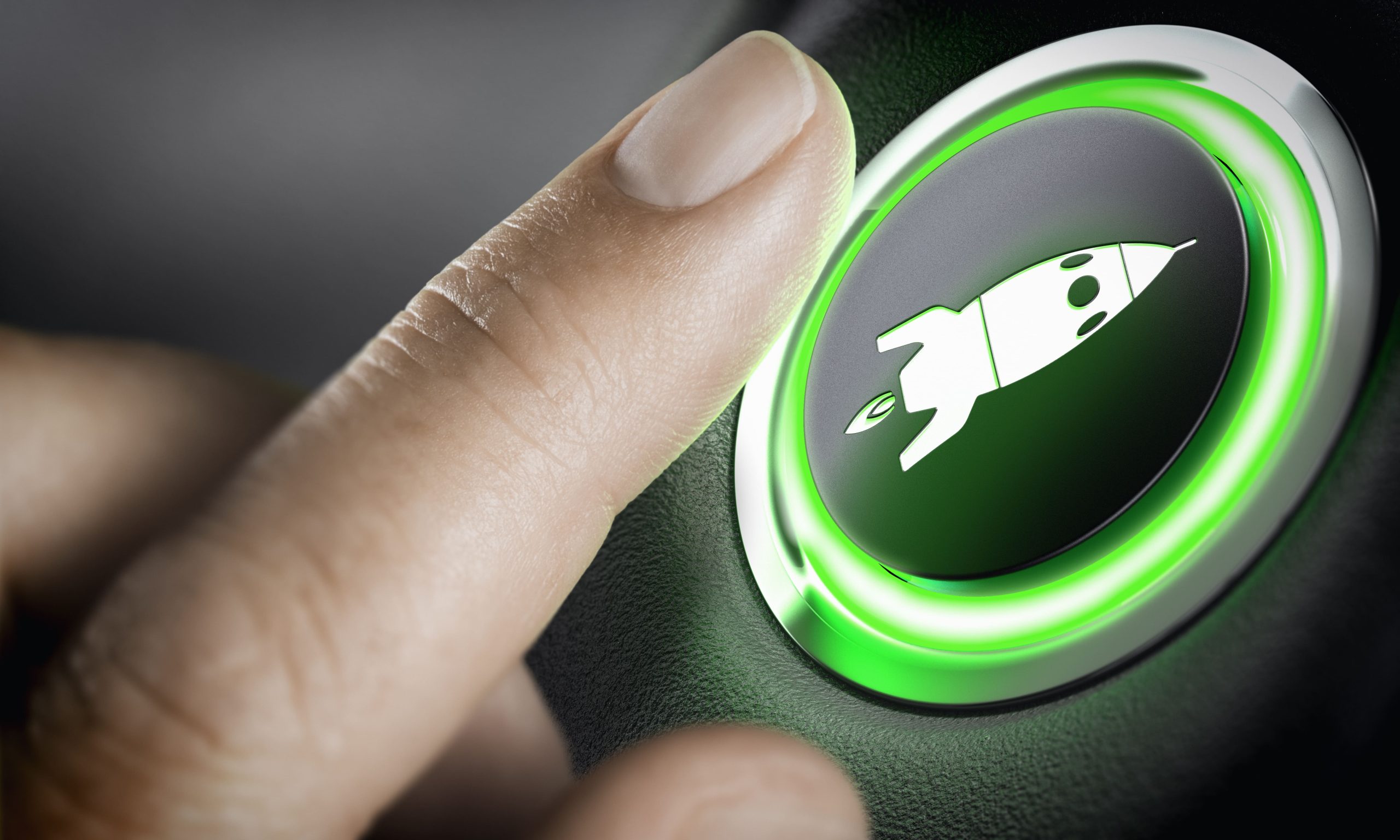 man-finger-pressing-boost-button-with-rocket-icon-black-background-green-light-composite-photography-3d-background-start-up-concept-1-scaled