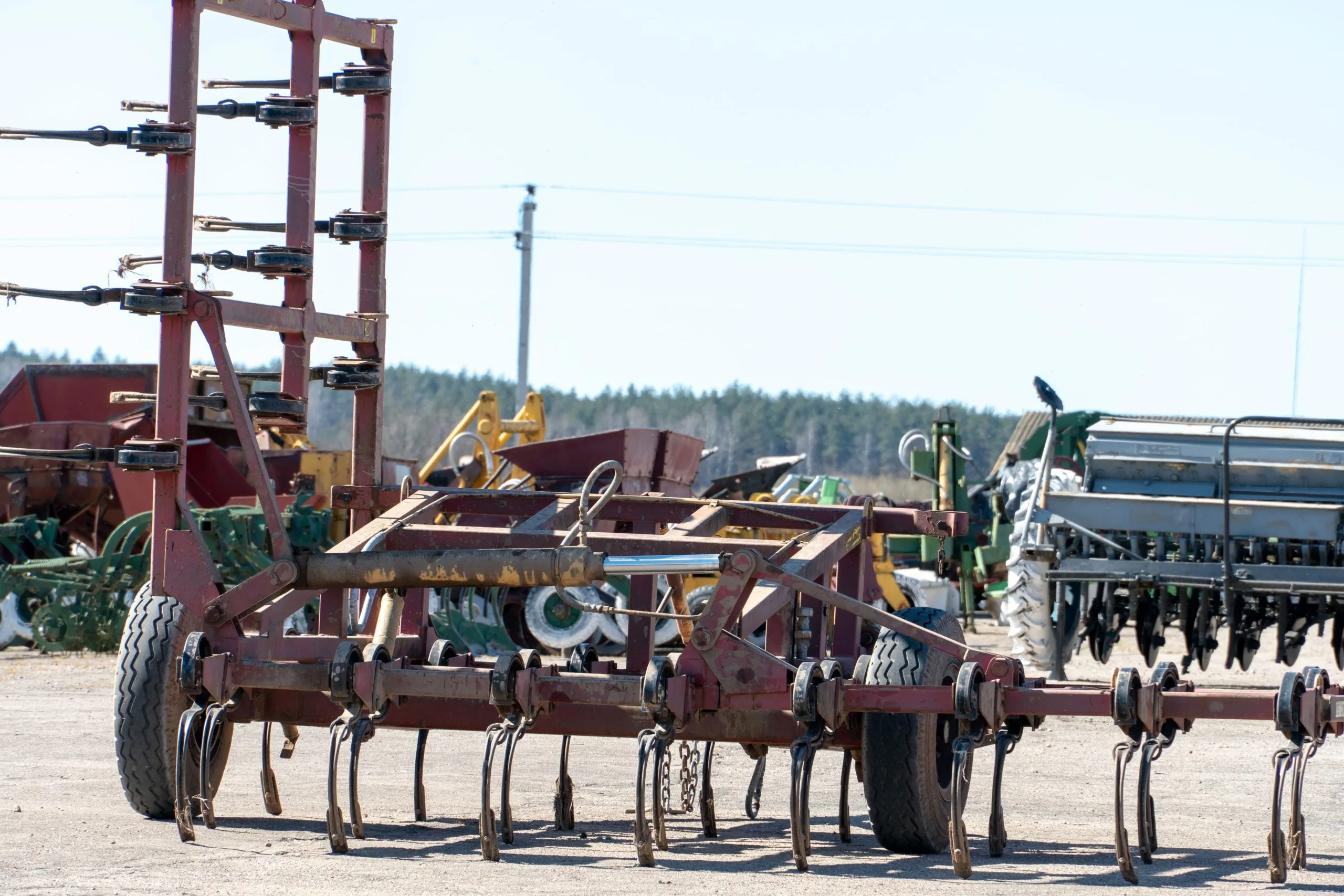 USA Farm Equipment Powertrain Components Engine Drivetrain and Transmission Market Outlook to 2035 modern-agricultural-machinery-planting-harvesting-vegetables-agricultural-plow-closeup-parking-lot-agricultural-machinery-1-scaled
