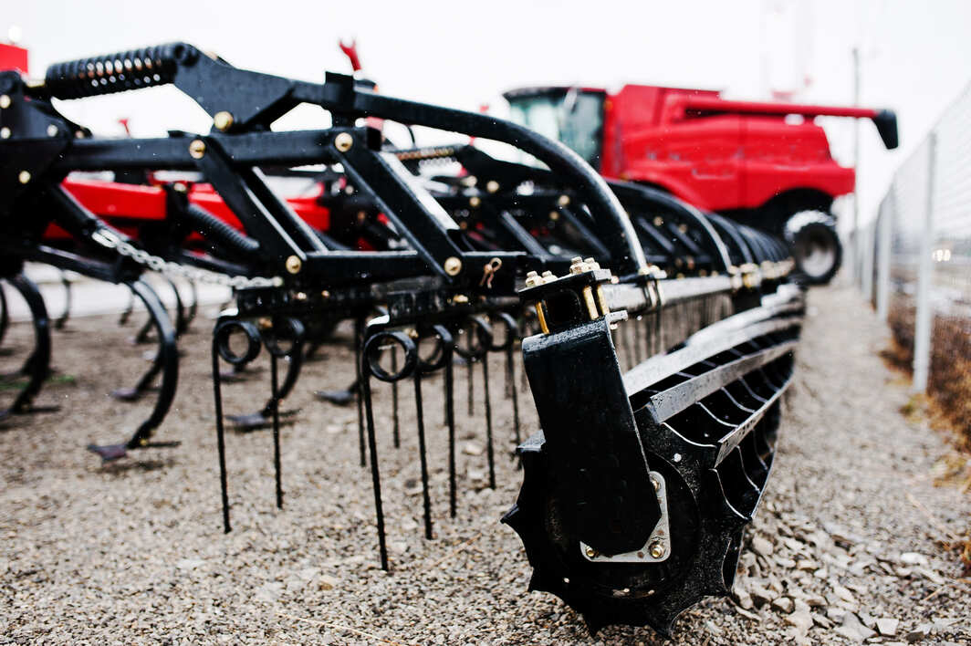 new-red-agricultural-seeder-close-up-view-1