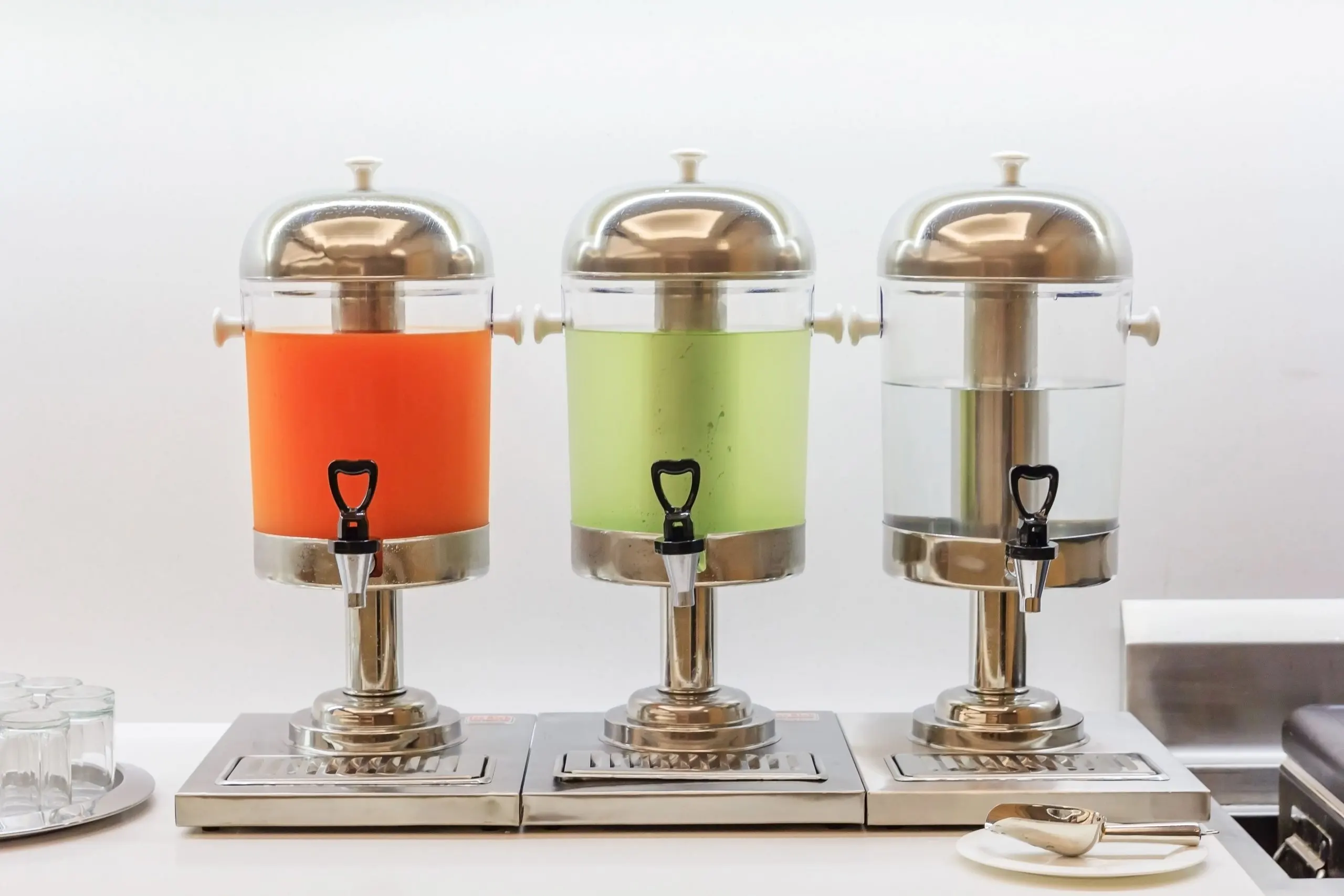 India decoys and dispensers Market outlook 2035 orange-mix-juice-from-tropical-fruits-stainless-steel-tank-self-service-1-scaled