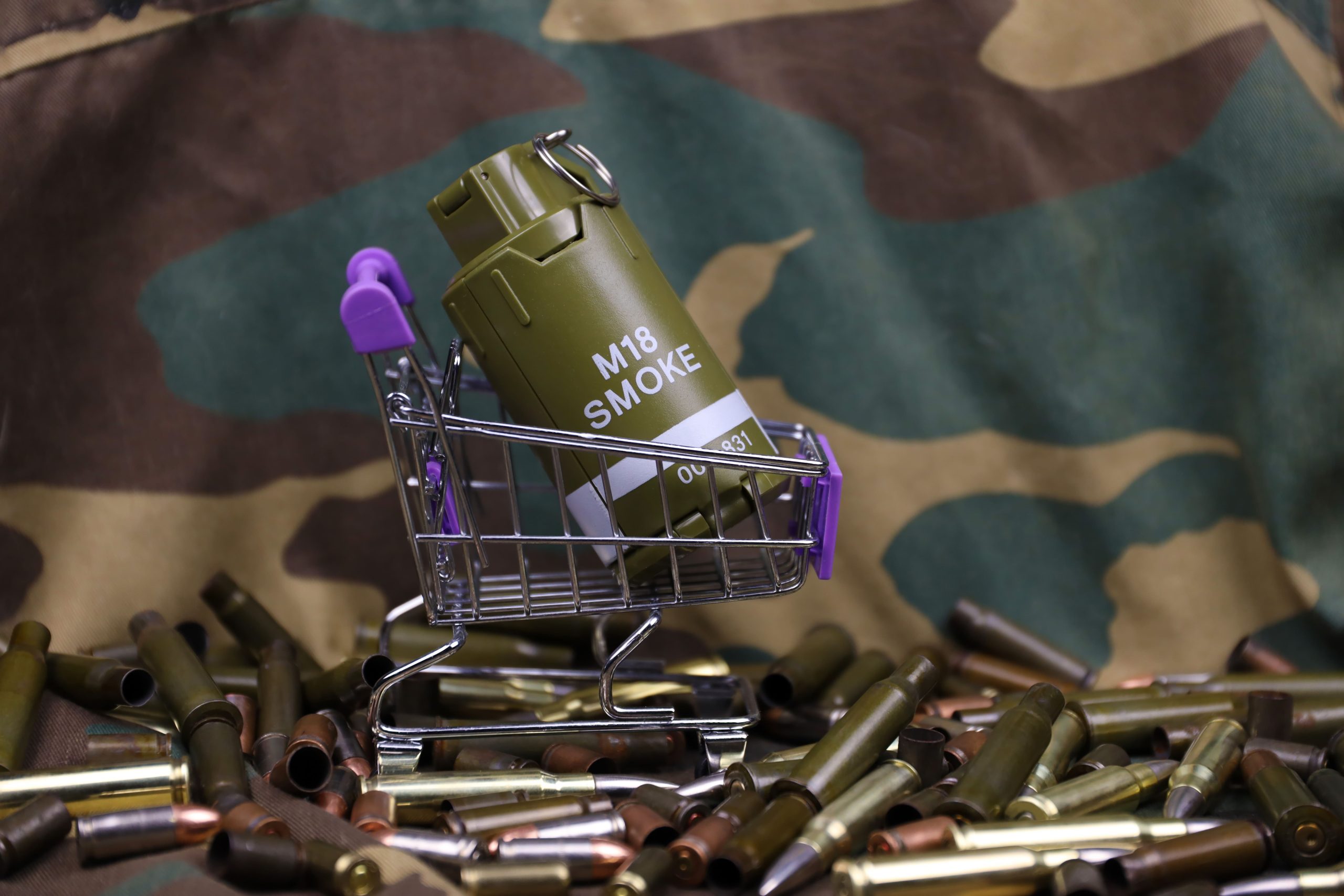 rifle-cartridges-small-shopping-cart-big-caliber-ammo-cartridges-hand-grenades-with-small-2-1-scaled