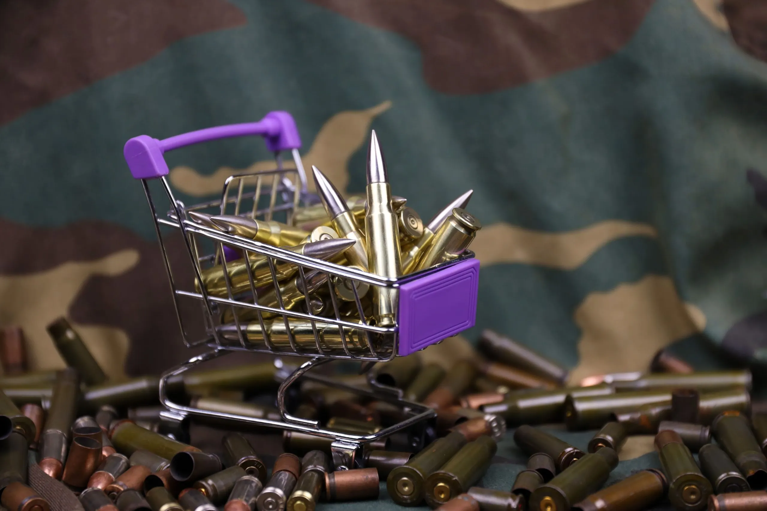 brazil small arms ammunition Market outlook 2035 rifle-cartridges-small-shopping-cart-big-caliber-ammo-cartridges-with-small-shopping-basket-1-scaled