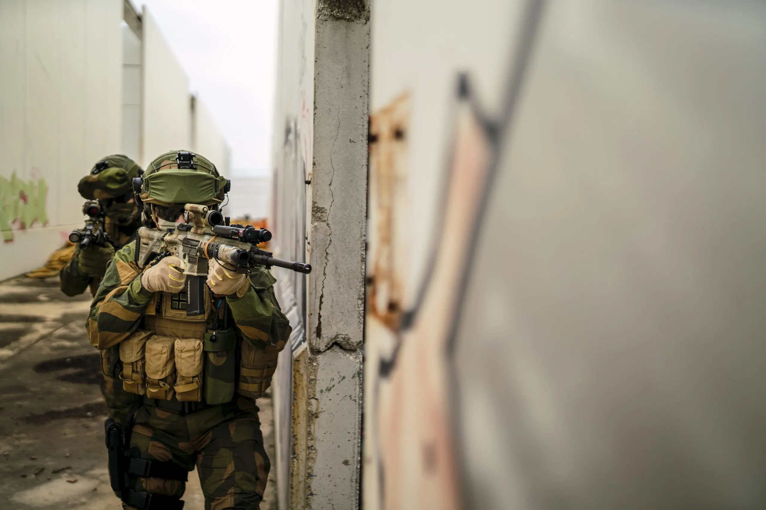 KSA CBRNE Defense Market outlook to 2035 shallow-focus-group-special-force-soldiers-investigating-abandoned-area-1-scaled