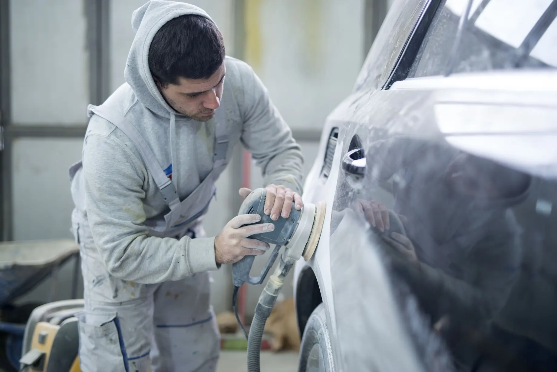 USA Automotive Paints and Coatings Market Outlook 2030 shot-professional-repairman-preparing-vehicle-new-paint-1