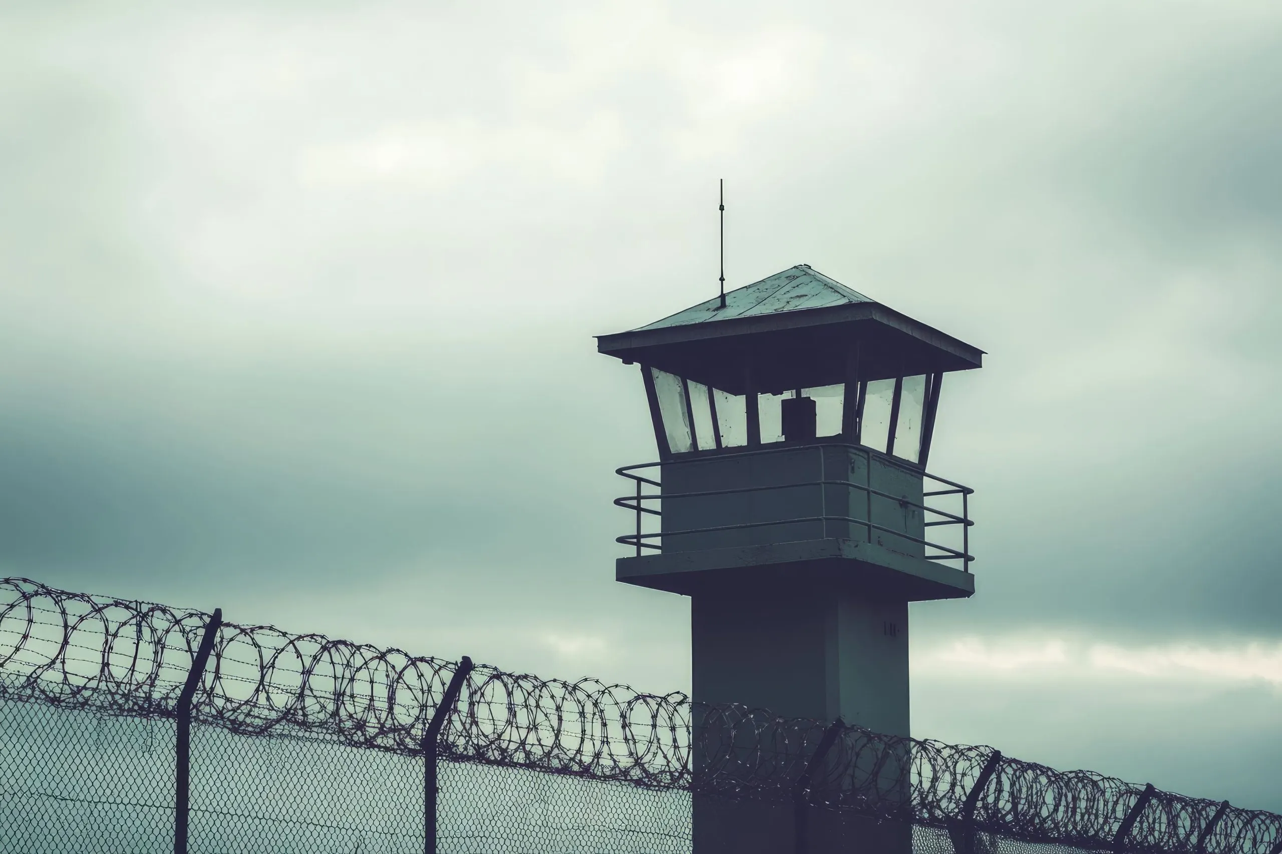 US border security Market outlook 2035 solitary-prison-guard-tower-with-barbed-wire-fences-conveying-sense-watchfulness-ar-32-v-61-j-1-scaled