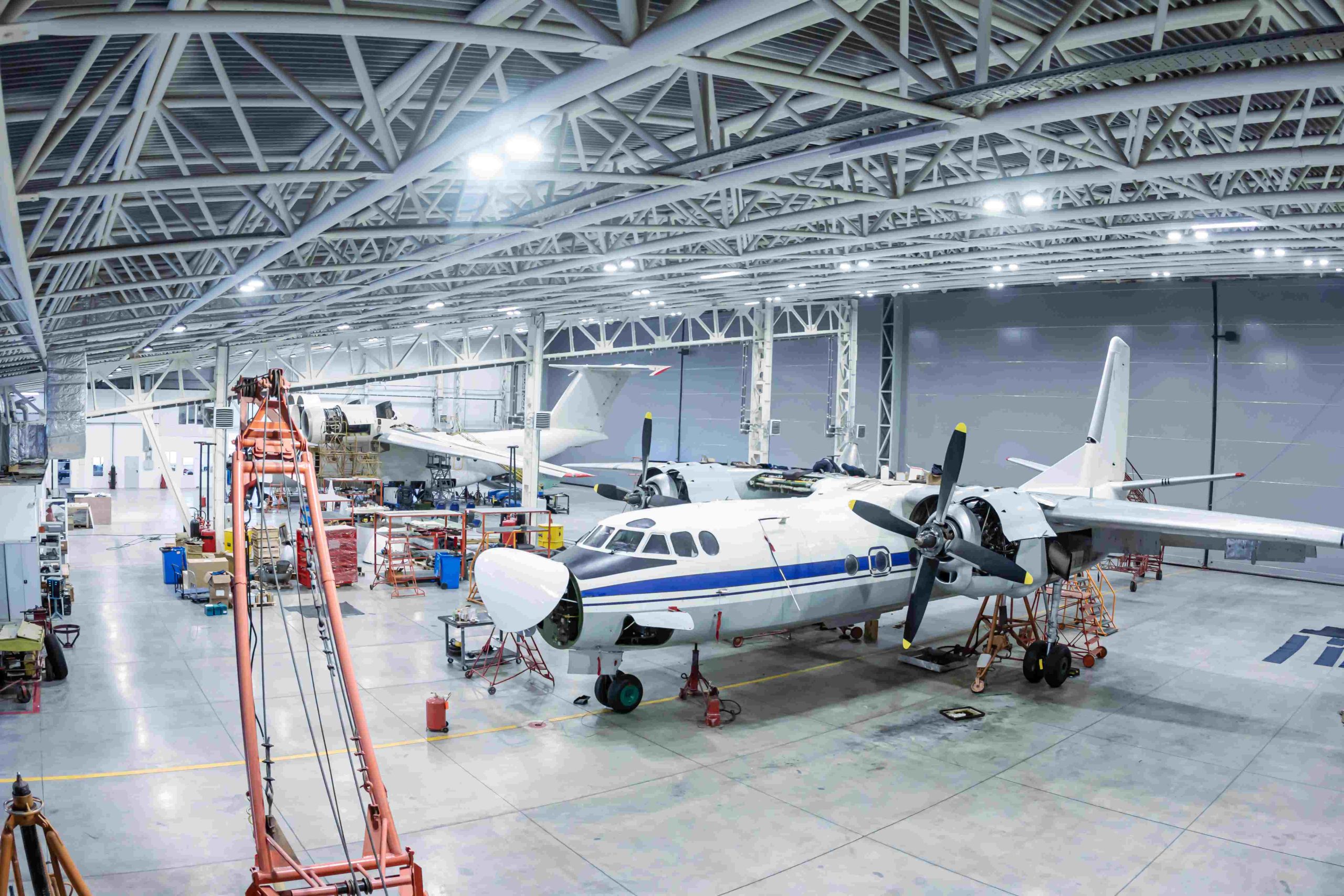Singapore Aviation Manufacturing Market outlook to 2035 transport-aircrafts-hangar-airplanes-maintenance-checking-mechanical-systems_compressed-scaled