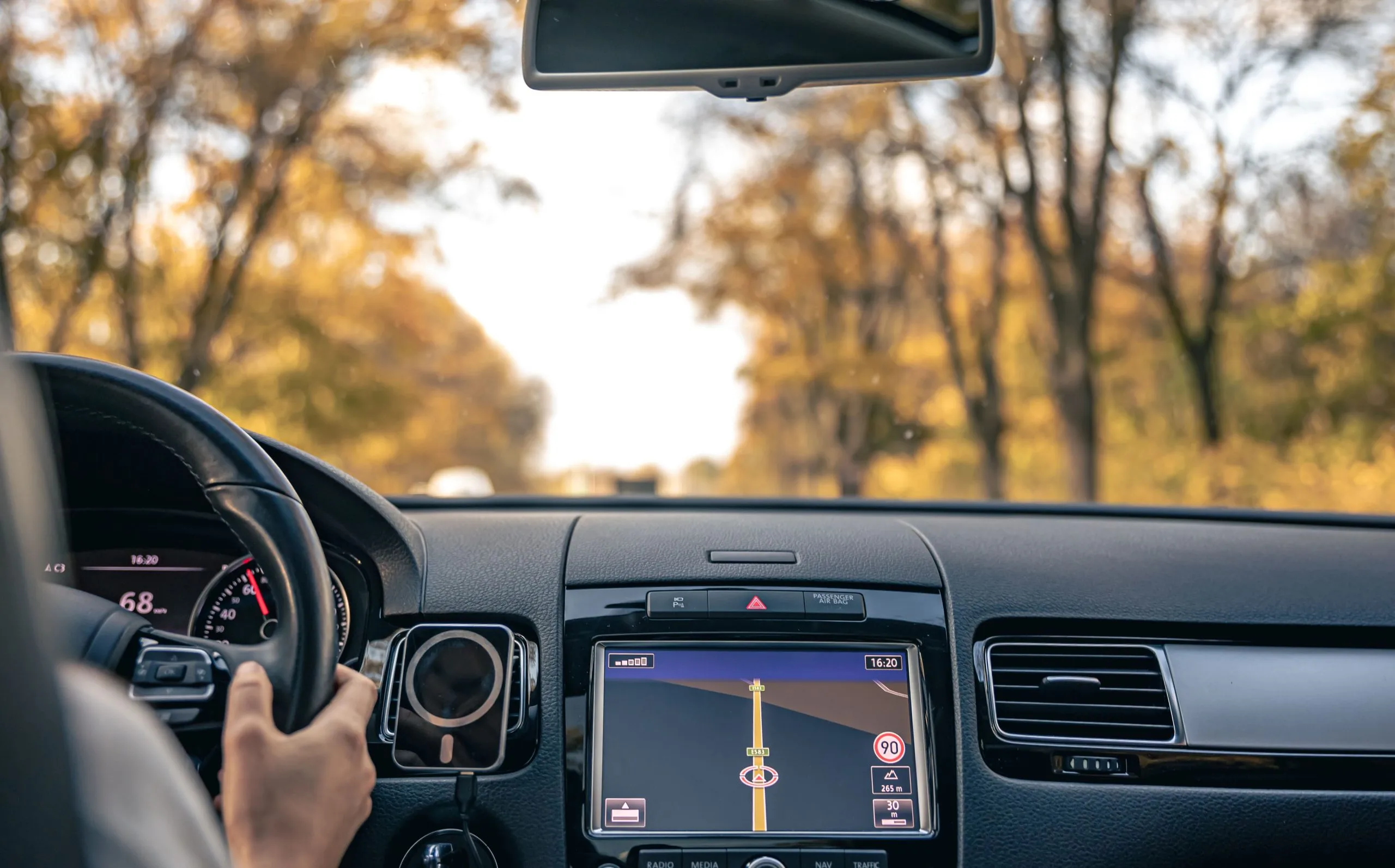 USA Adaptive Cruise Control Systems Market Outlook 2030 woman-driver-hands-steering-wheel-inside-car-1-scaled