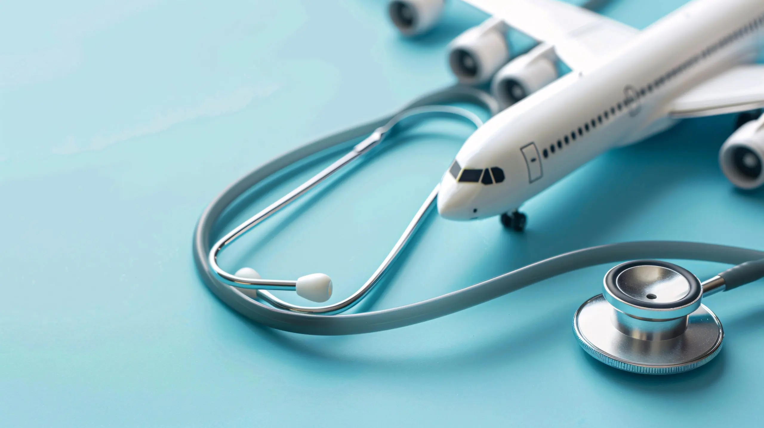 USA Medical Tourism Market Outlook to 2035 07231249-288-detailed-shot-model-airplane-stethoscope-blue-background-emphasizing-concept-medical-tourism-intersection-healthcare-travel-scaled