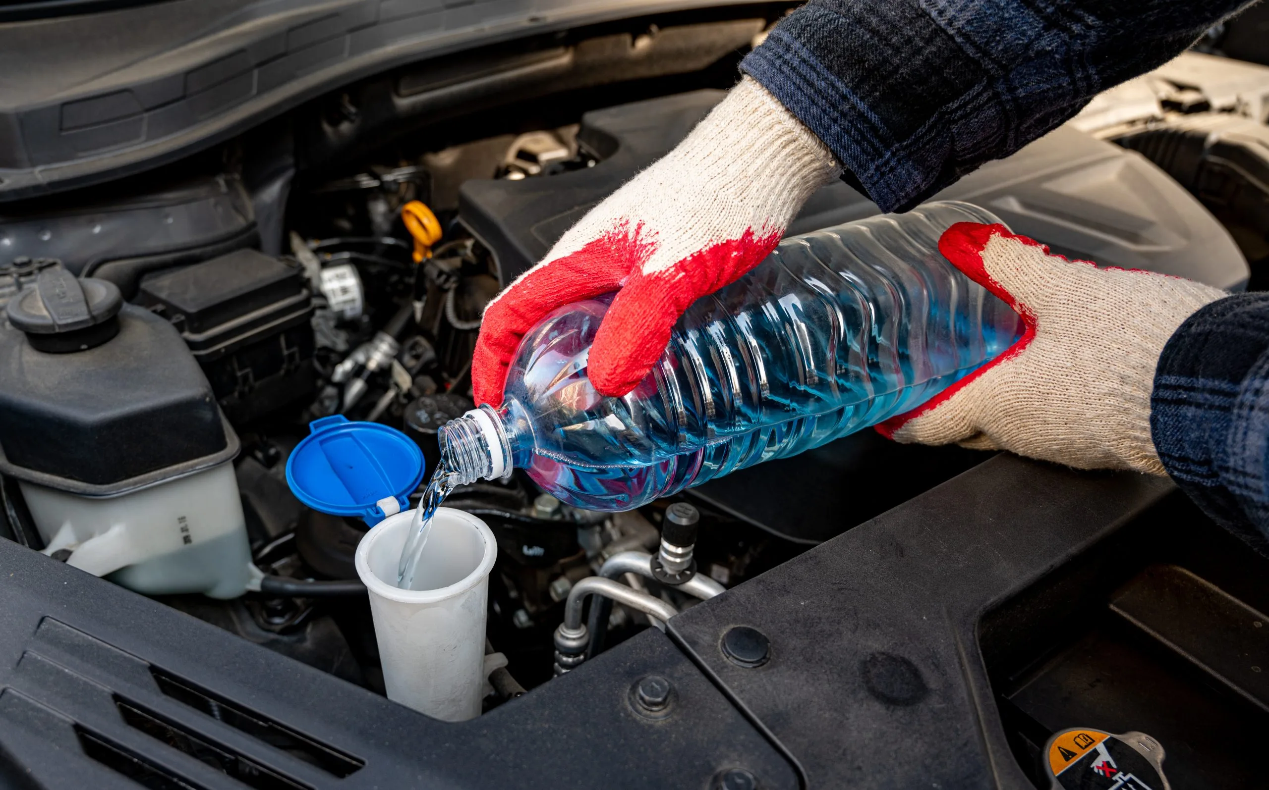 Philippines Coolants Market Outlook to 2035 automobile-maintenance-filling-windshield-washer-fluid-car-scaled