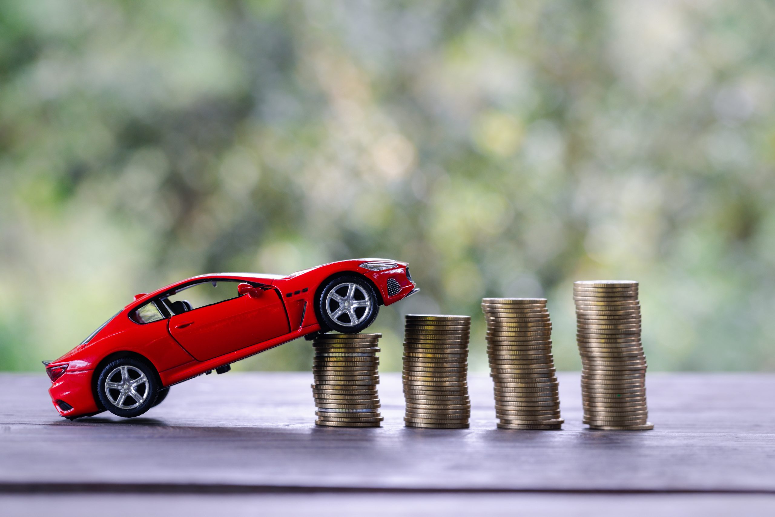 car-model-money-coins-pile-finance-car-loan-saving-money-car-coins-insurance-loan-buying-car-finance-concept-buy-installments-down-payment-car-scaled