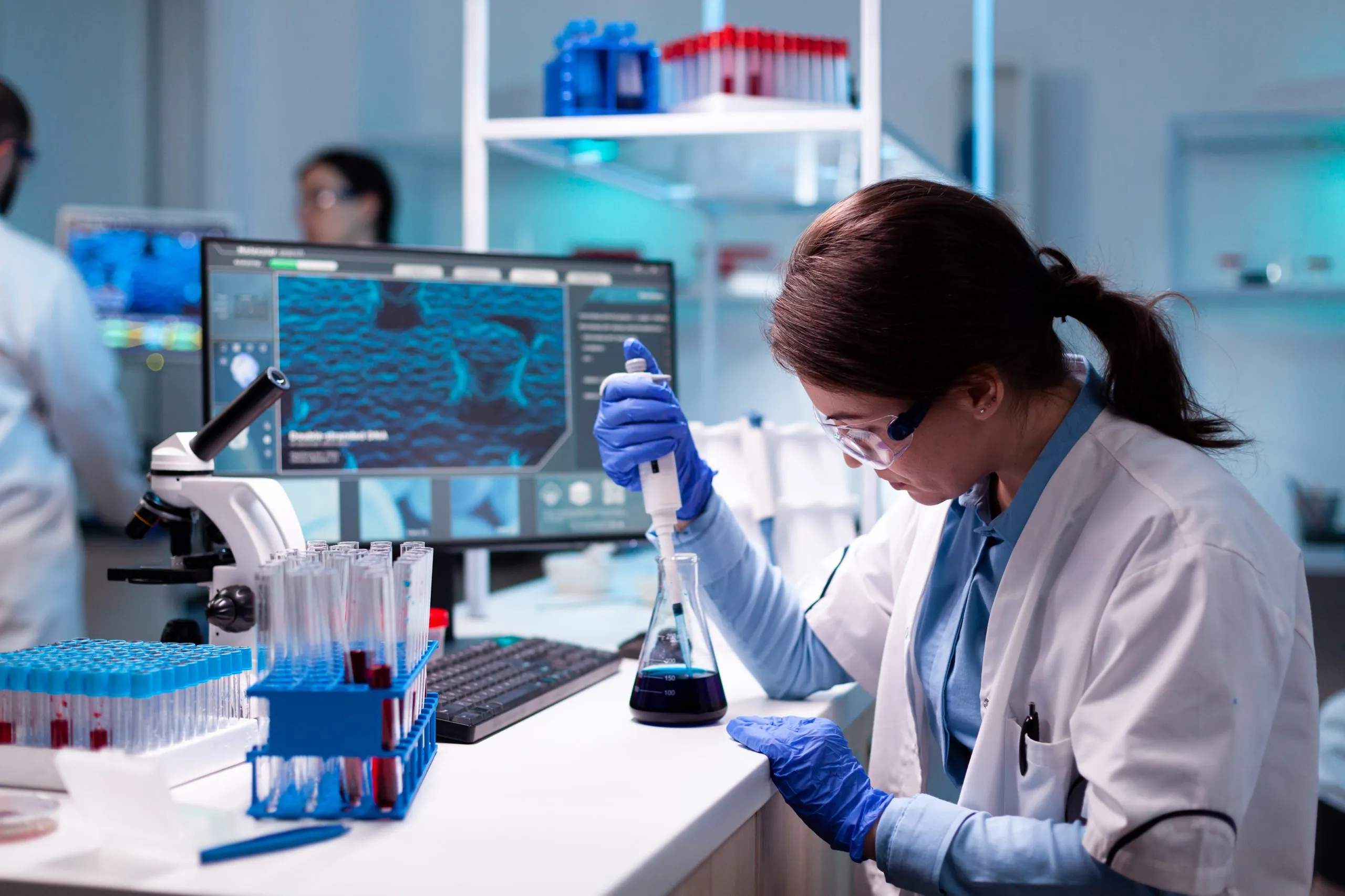 Indonesia Diagnostic Labs Market Outlook to 2035 chemistry-doctor-engineering-virus-with-mciropiette-medicine-dropper-scaled