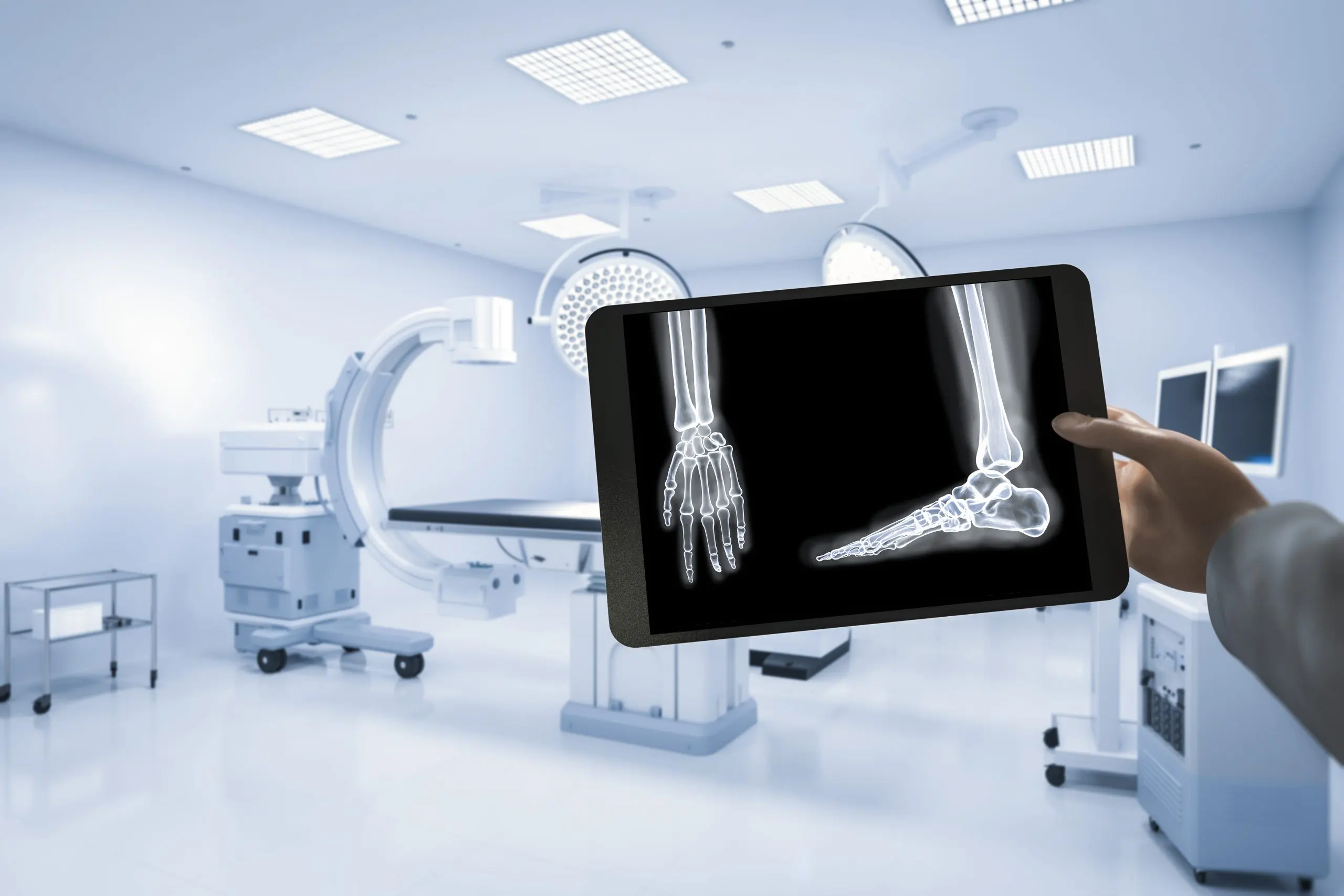 UAE Bone SPECT Equipment Market Outlook 2035 hand-holding-x-ray-film-with-3d-rendering-mri-scan-machine-magnetic-resonance-imaging-scan-device-scaled
