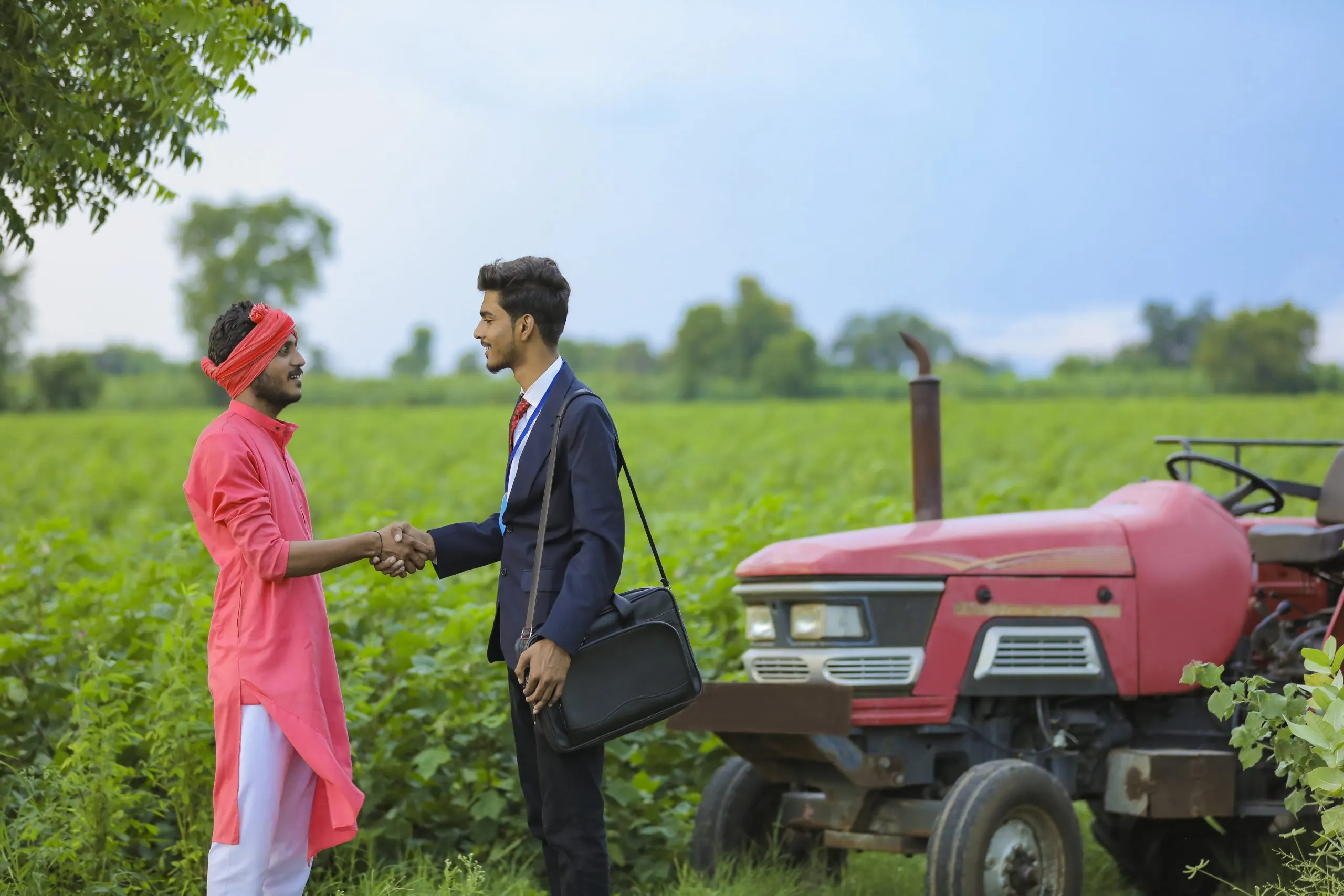 India Agricultural Engine Market Outlook to 2035 indian-farmer-banker-standing-field-scaled