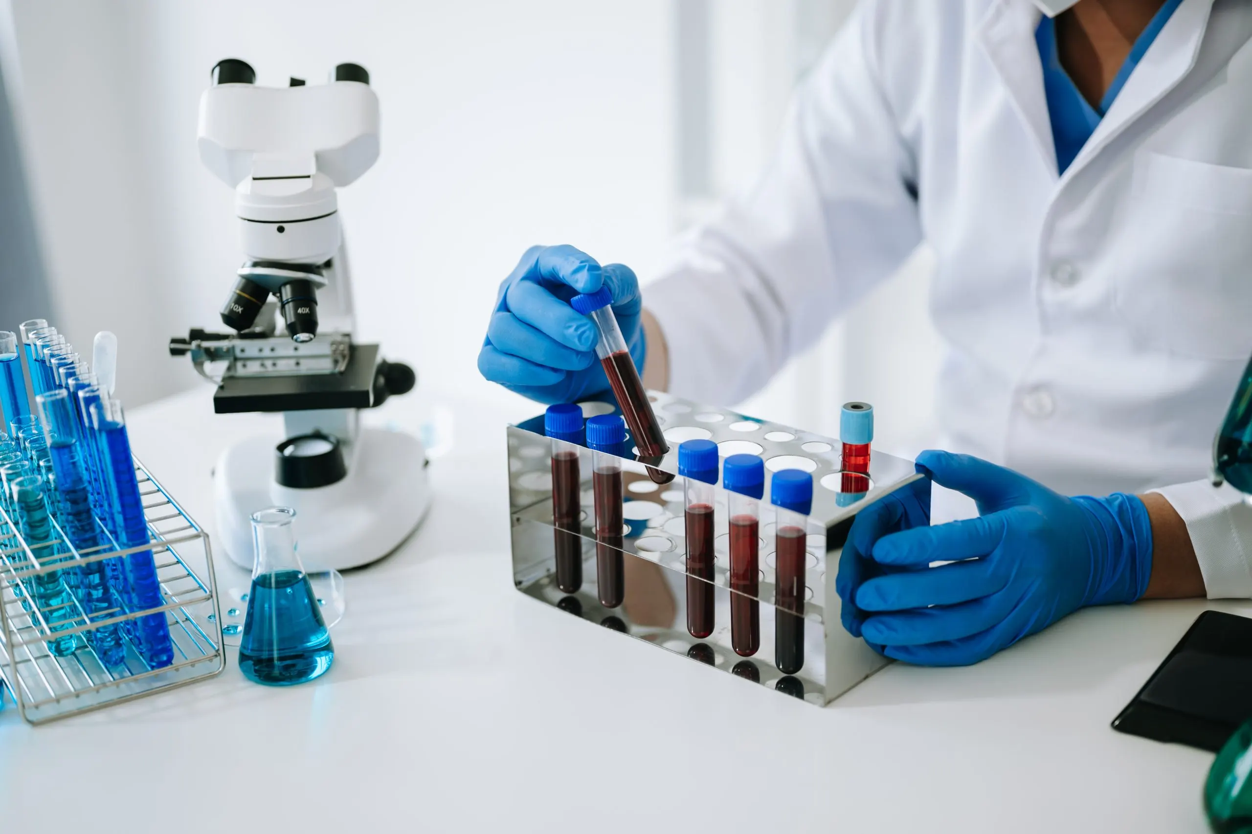 Spain Diagnostic Labs Market Outlook to 2035 male-scientist-researcher-conducting-experiment-laboratoryxa-scaled