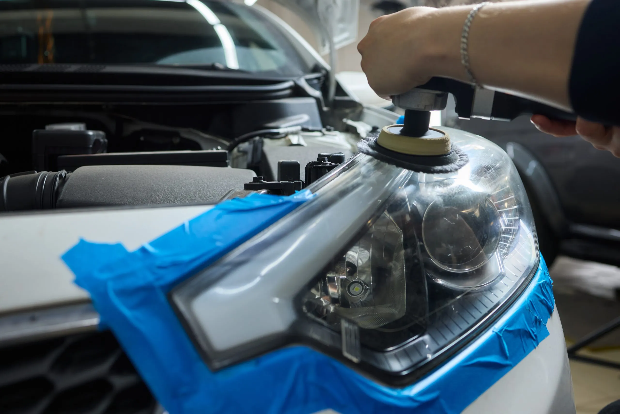 Philippines Automotive Sealants Market Outlook to 2035 person-using-machine-polish-automotive-lighting-car-headlight-1-scaled