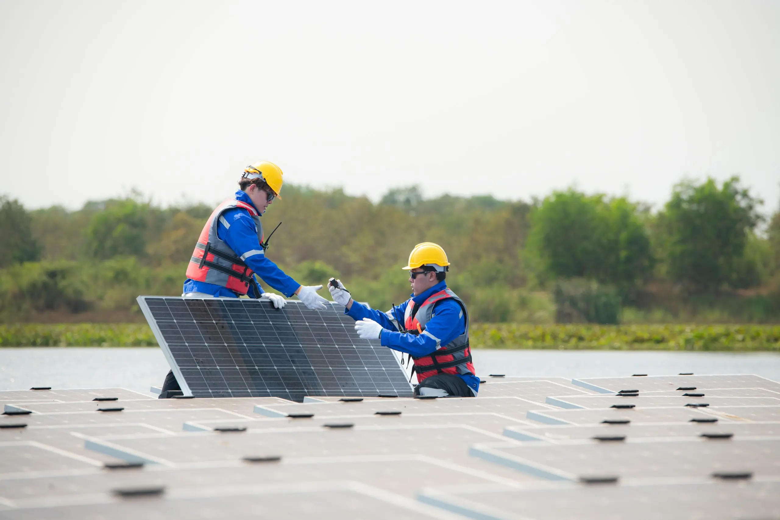 Kenya Solar EPC Market Outlook to 2035 photovoltaic-engineers-work-floating-photovoltaics-inspect-repair-solar-panel-equipment-scaled