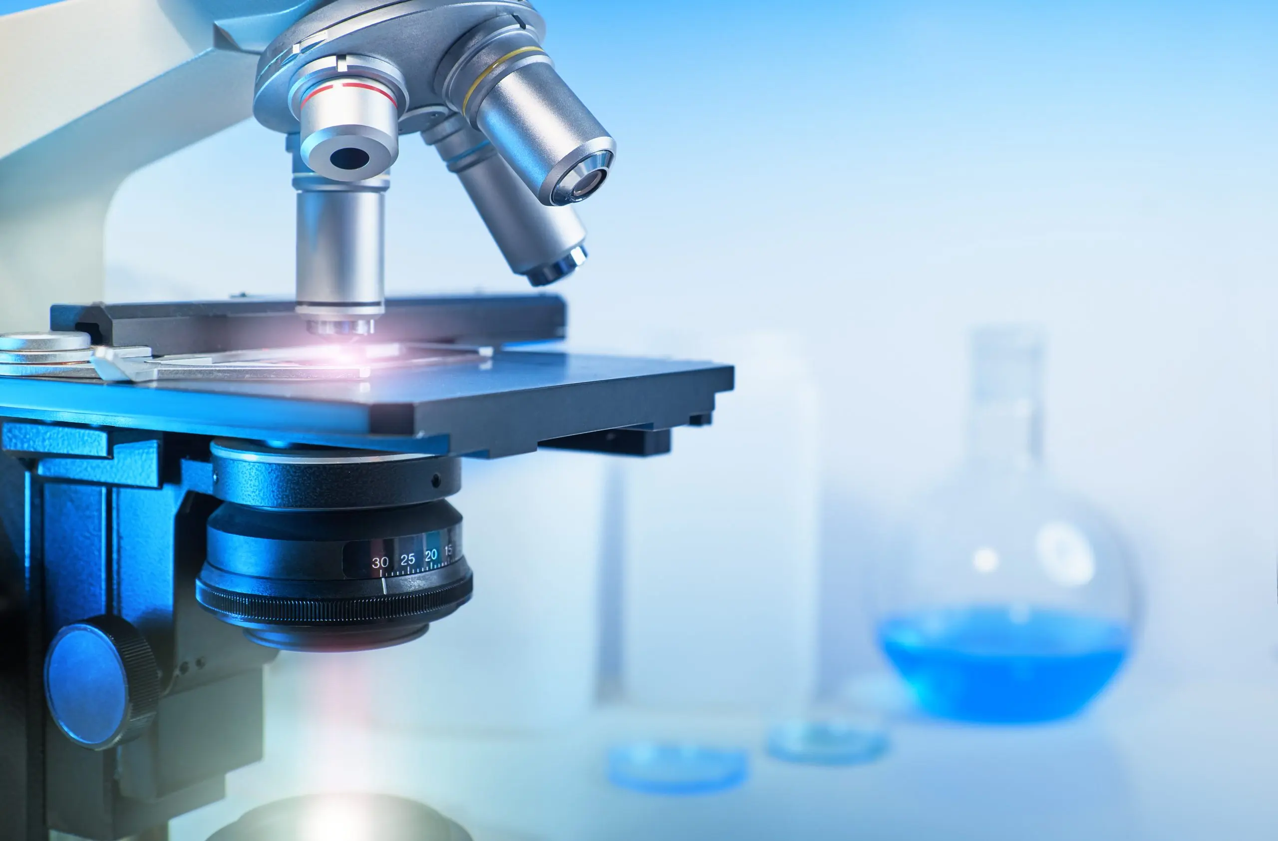Oman Diagnostic Labs Market Outlook to 2035 scientific-with-closeup-light-microscope-laboratory-out-focus-scaled