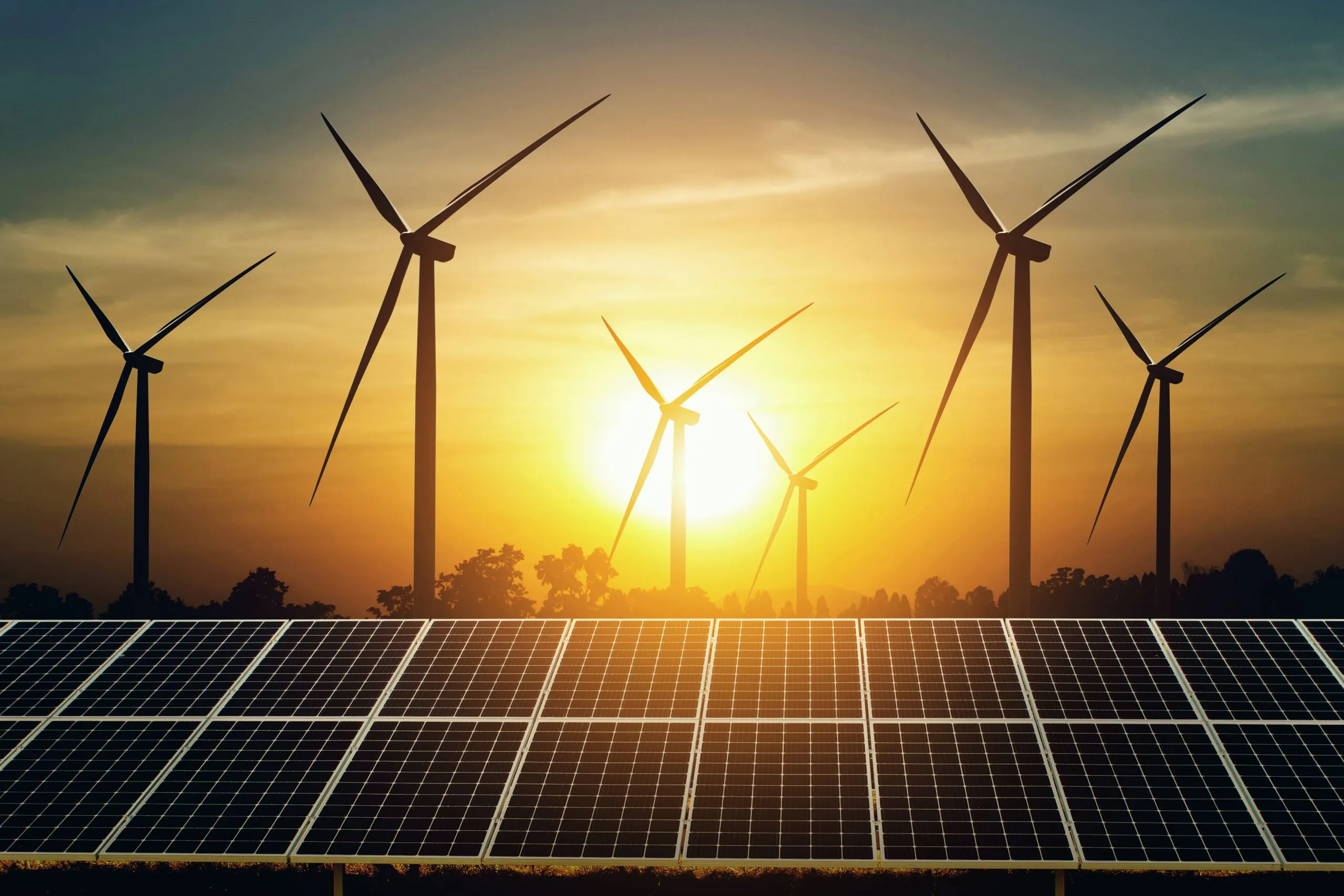 Nigeria Renewable Energy Market Outlook to 2035 solar-panel-turbine-with-sunset-background-scaled