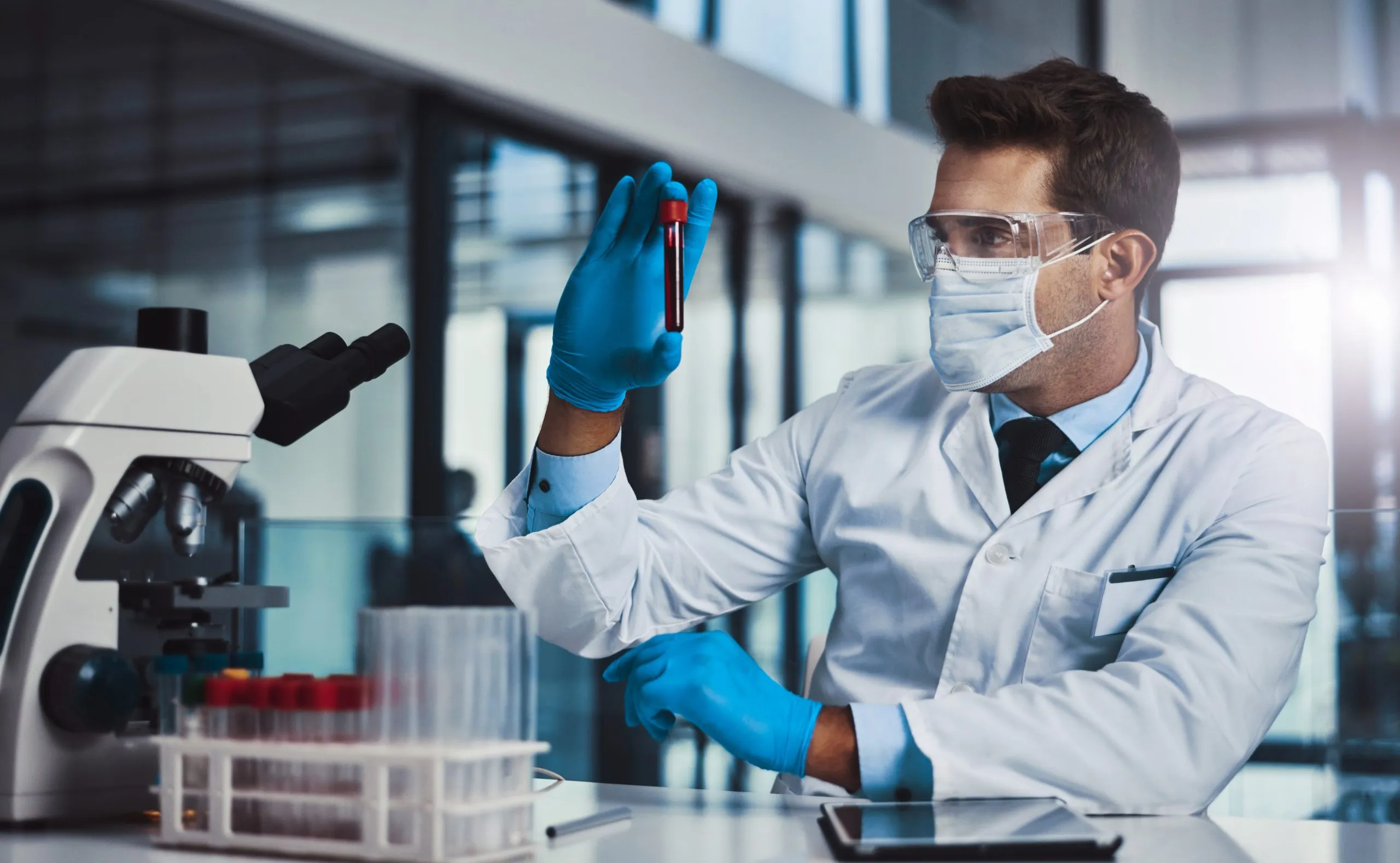 UK Diagnostic Labs Market Outlook to 2035 this-could-be-cure-cropped-shot-young-male-scientist-working-lab-scaled