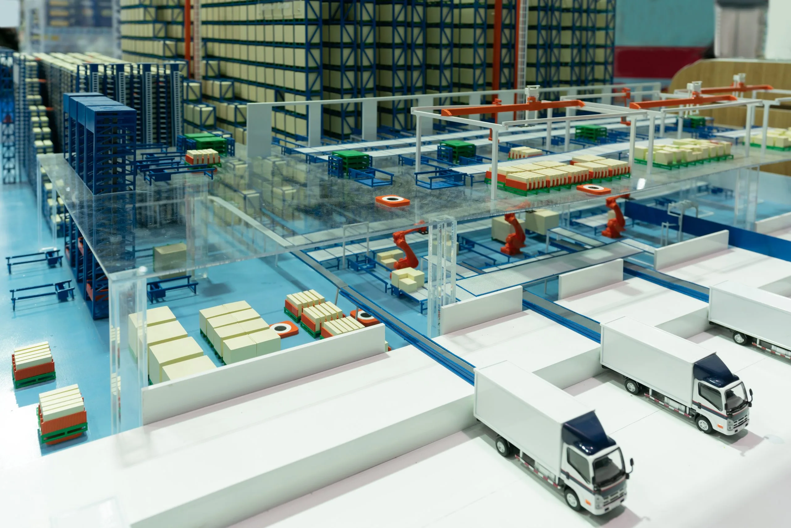 Oman Cold Chain Logistics Market Outlook to 2035 truck-warehouse-loading-docks-automated-warehouse-boxes-with-spare-parts-moving-conveyer-scaled