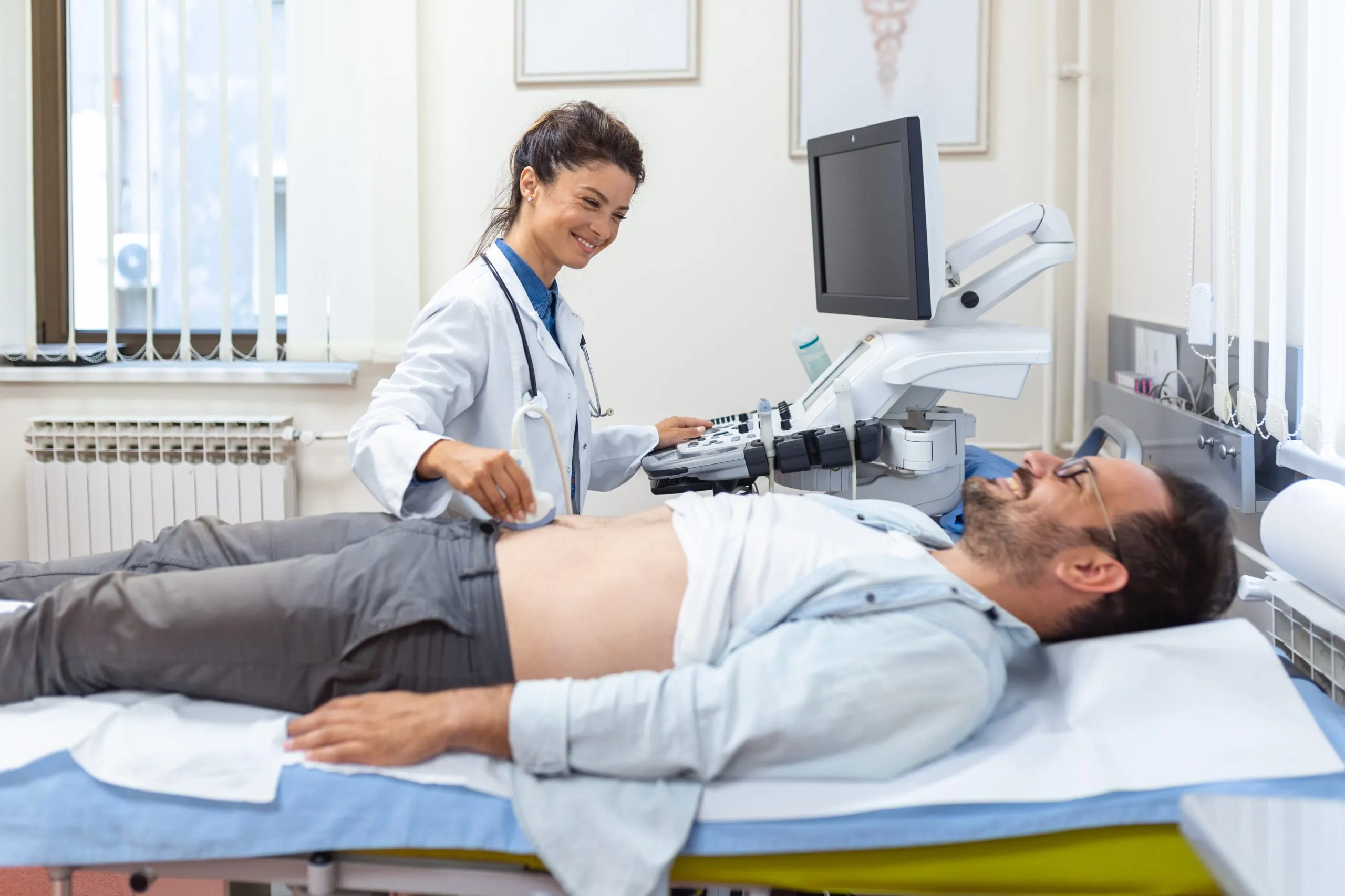 Philippines Abdominal Ultrasound Equipment Market Outlook 2035 ultrasound-diagnosis-stomach-abdominal-cavity-man-clinic-closeup-view-doctor-runs-ultrasound-sensor-patients-male-abdomen-diagnostics-internal-organs-scaled