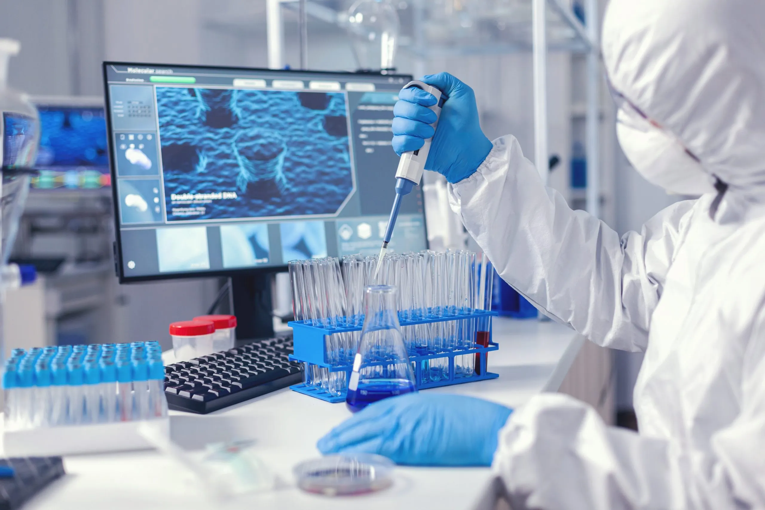 Kenya Diagnostic Labs Market Outlook to 2035 virolog-coducting-experiment-course-coronavirus-pandemic-with-micropipette-chemist-modern-laboratory-doing-research-using-dispenser-global-epidemic-with-covid-19-scaled