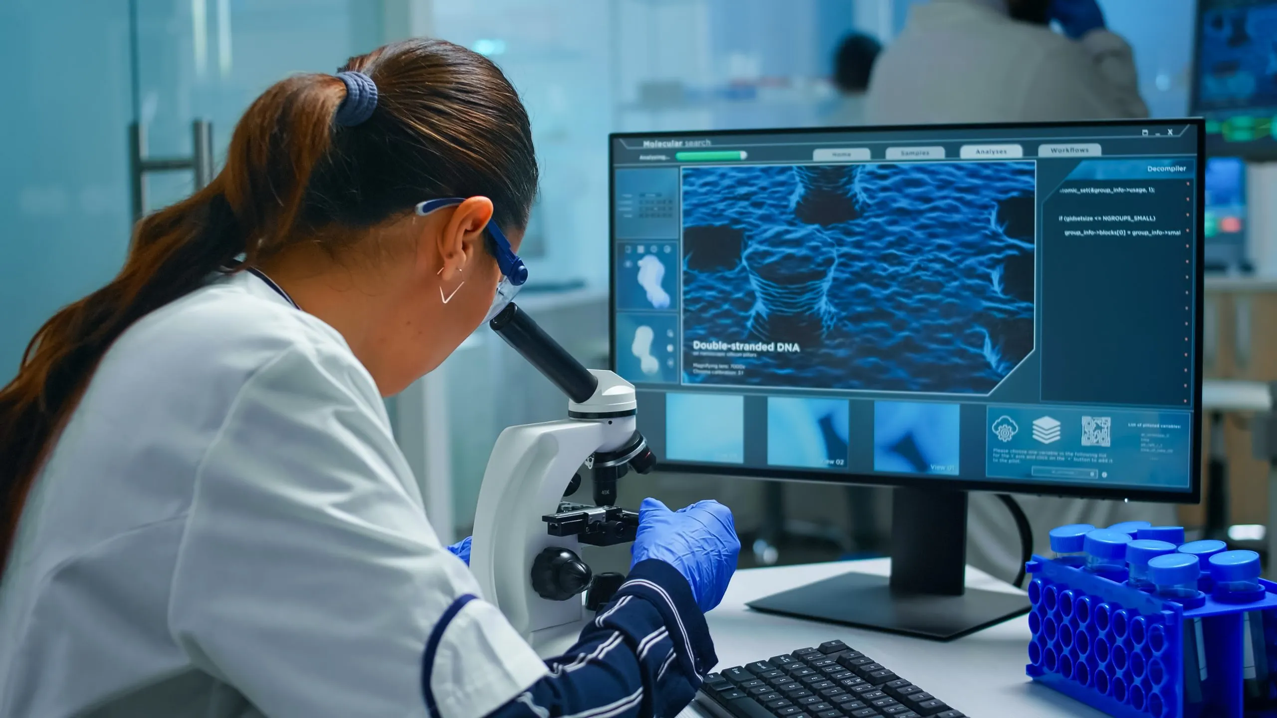KSA Predictive Biomarkers Market Outlook 2035 biochemist-using-microscope-writing-computer-sitting-equipped-laboratory-scientist-doctor-working-with-various-bacteria-tissue-blood-samples-pharmaceutical-research-antibiotics-scaled