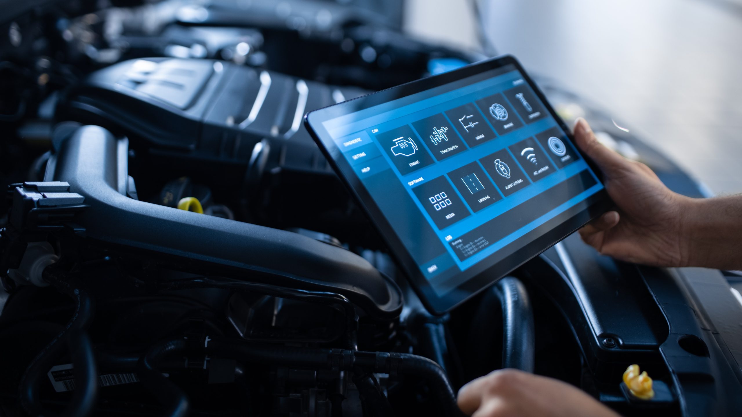 car-service-manager-mechanic-uses-tablet-computer-with-futuristic-interactive-diagnostics-software-specialist-inspecting-vehicle-order-find-broken-components-engine-bay-scaled