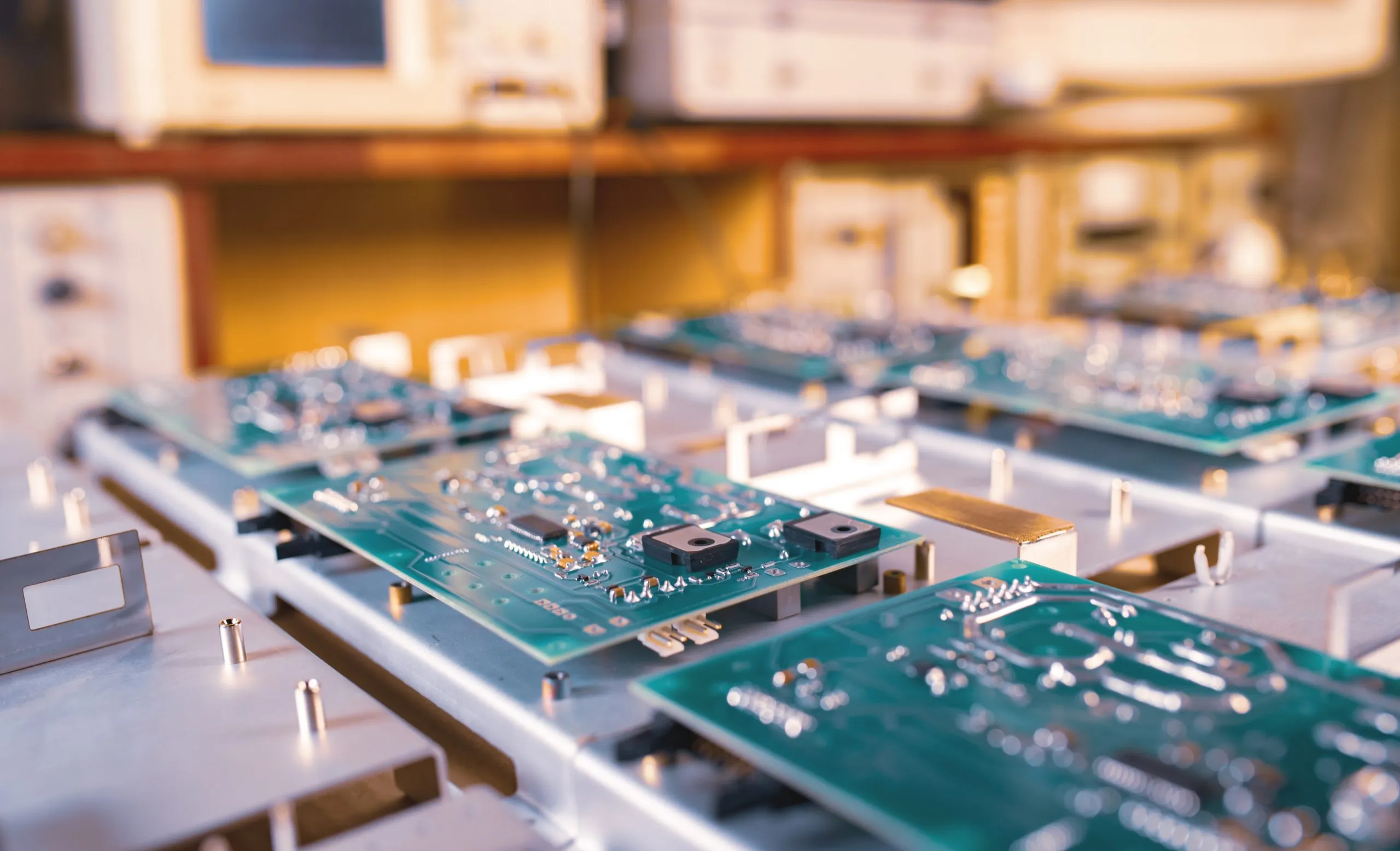 The Future of Oman Semiconductor Manufacturing and Industry Growth with 9.6% CAGR value close-up-computer-green-microcircuits-lie-row-after-row-industrial-production-computers-office-equipment-concept-developing-new-technologies-storing-information-scaled