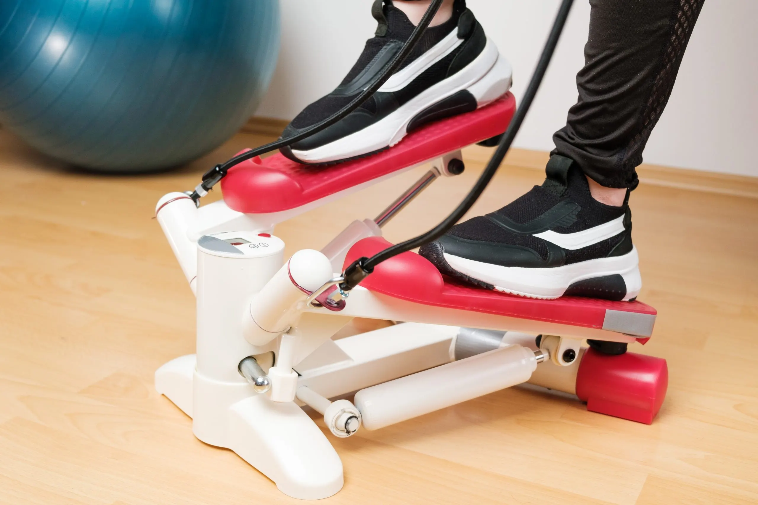 UK Home Fitness Equipment Market Outlook to 2035 close-up-womans-feet-sneakers-training-twist-stepper-scaled