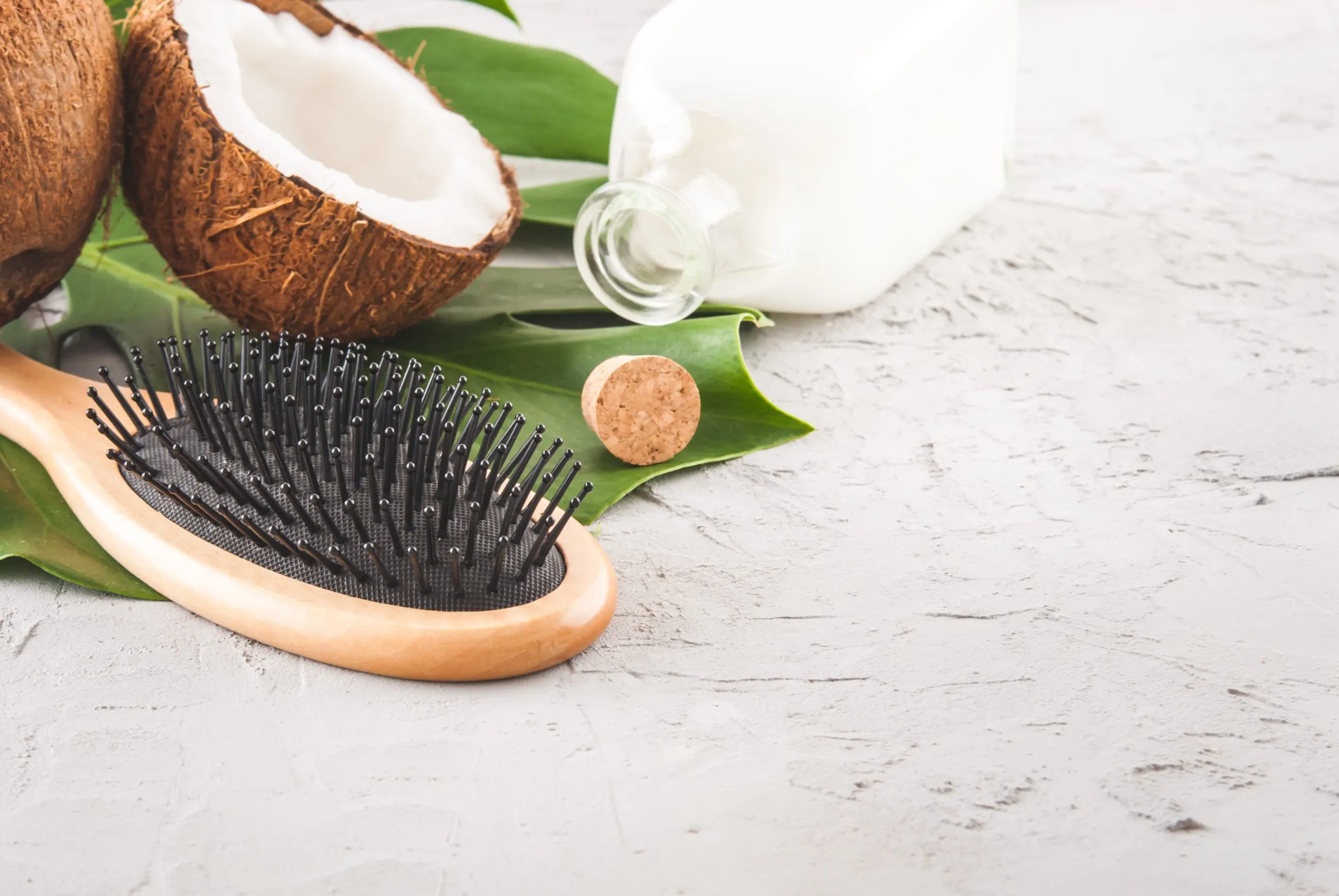 India Hair Loss Treatment Products Market Outlook to 2035 concept-hair-taking-care-with-coconut-oil-concrete-background-with-copy-space-scaled